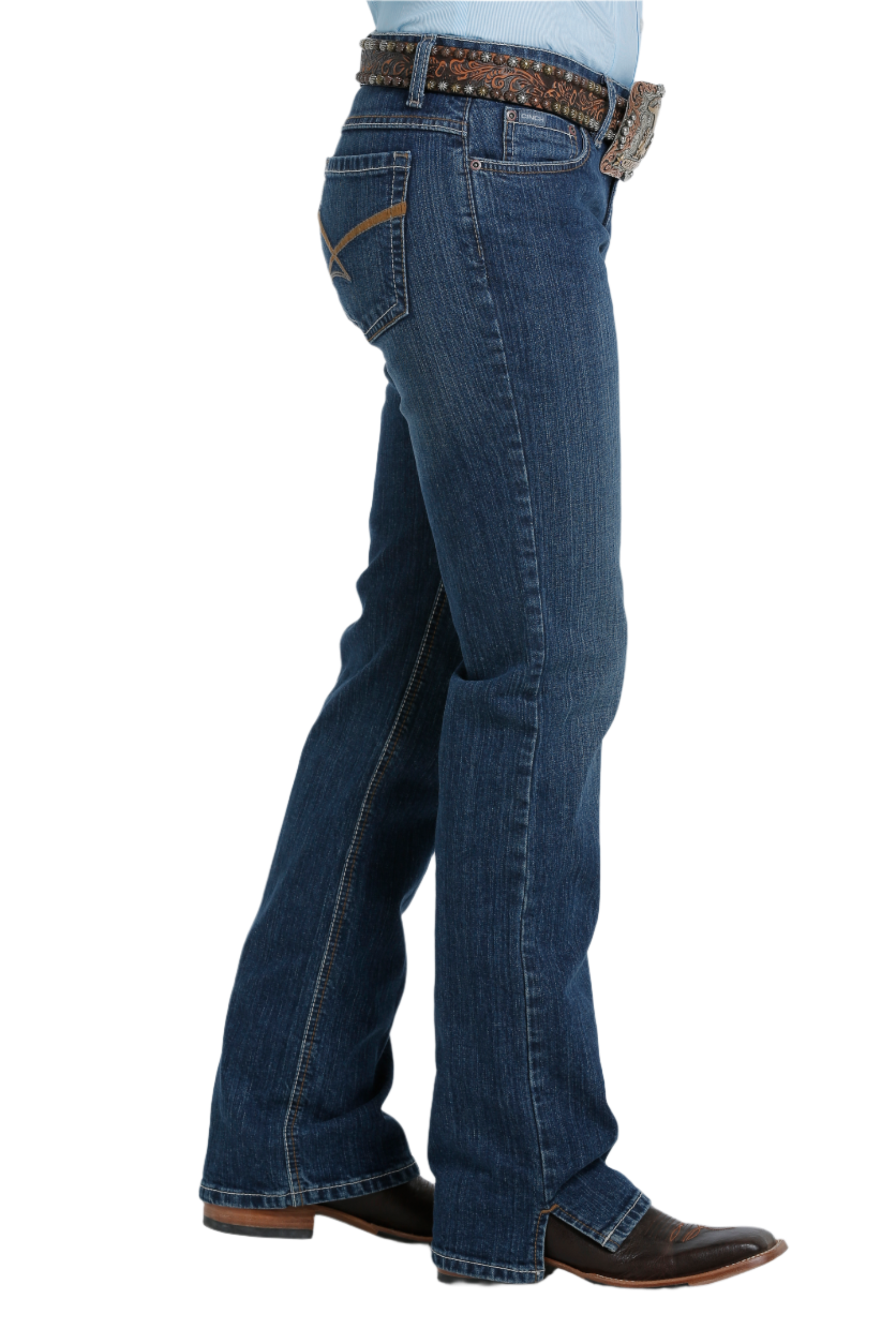Woman wearing blue jeans with boots and a belt