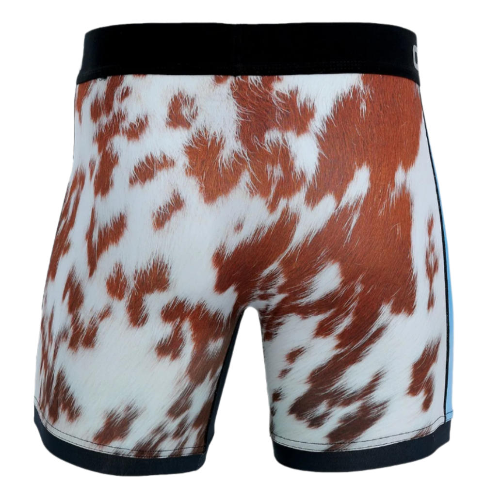 A pair of Cinch men's boxer briefs with a humorous cow print design on the back