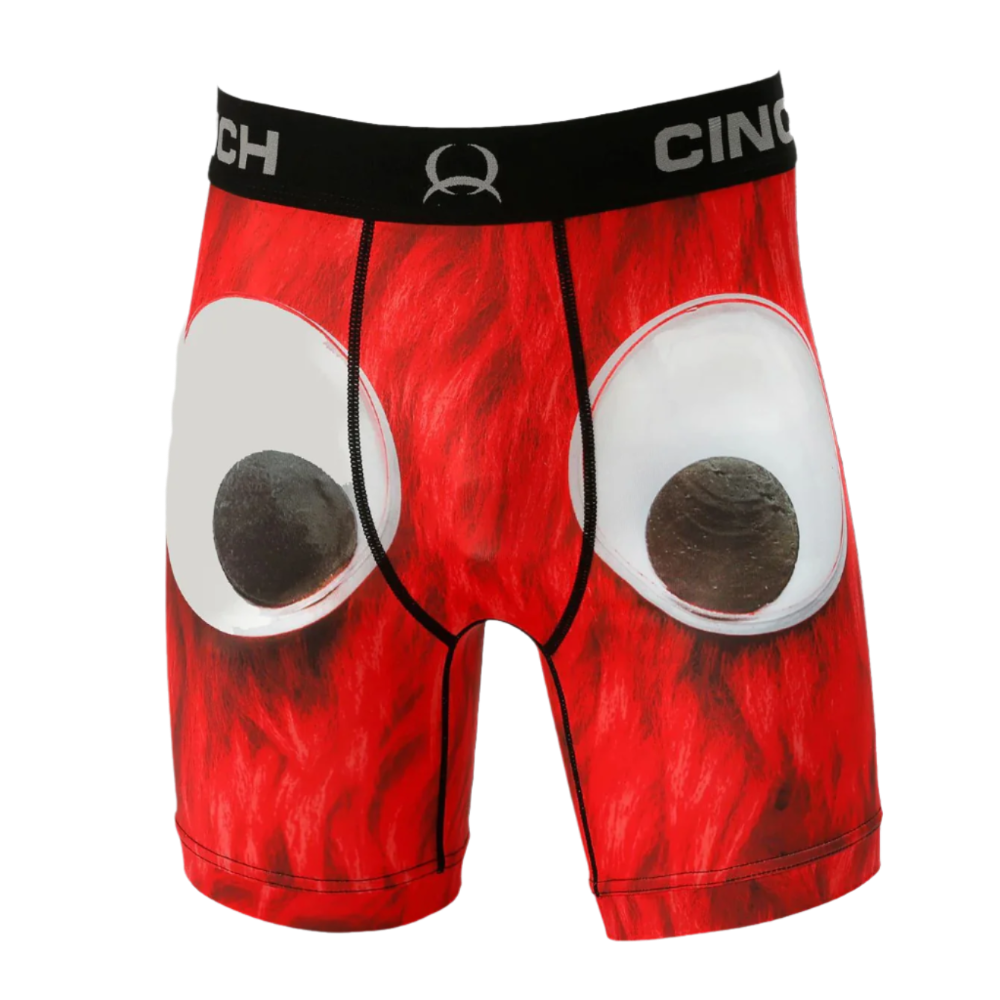 A pair of red Cinch men's boxer briefs with a white eye pattern on the front.