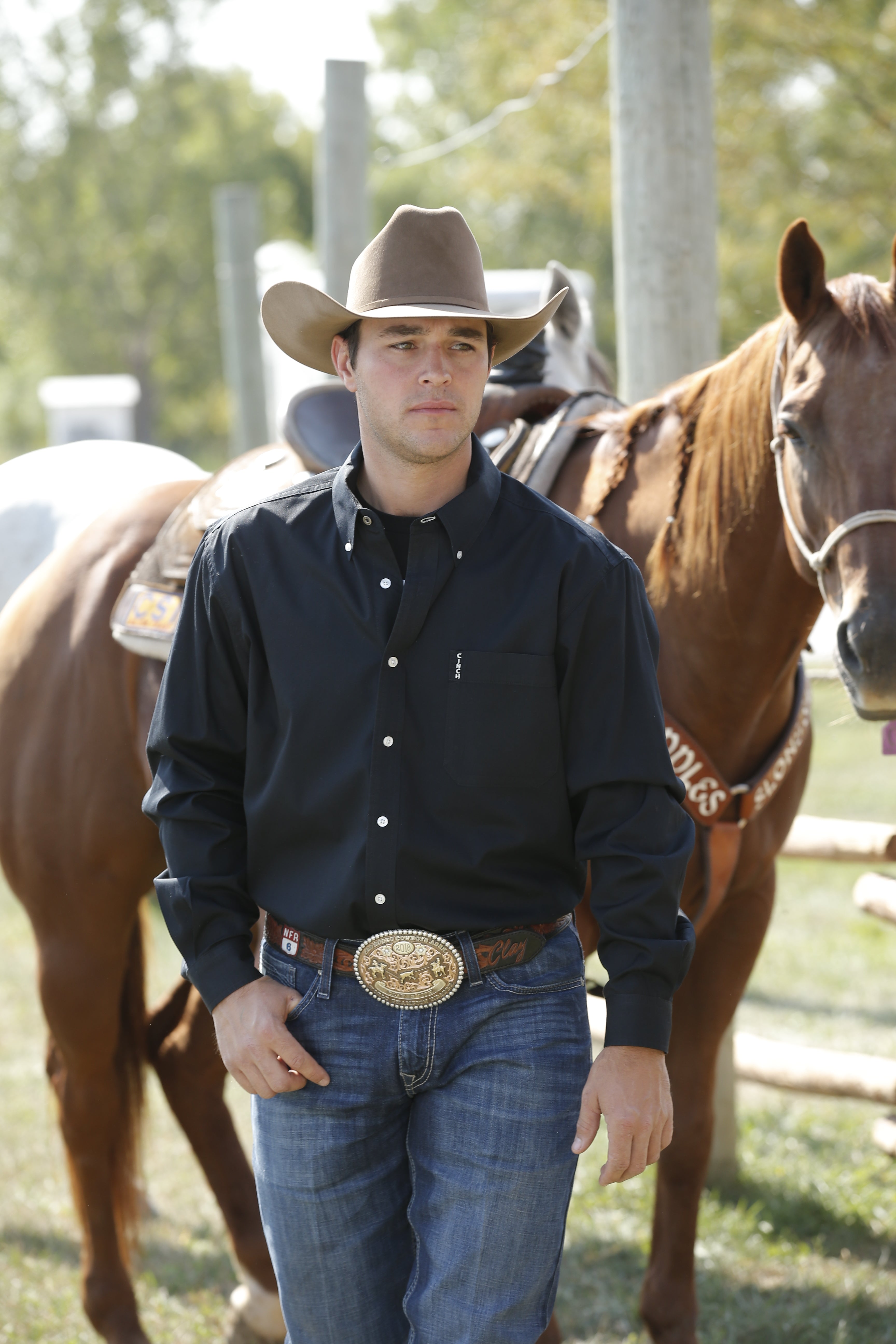 This is the perfect button down for the modern cowboy. Made by Cinch Jeans and available in Black, Cream, Blue, and Red.