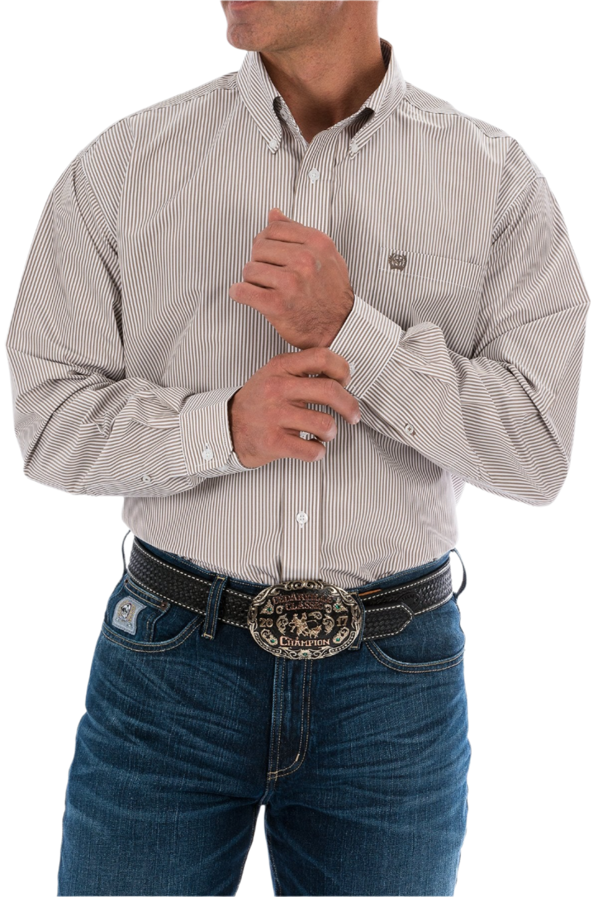 A man wearing a long sleeve striped button-down shirt in khaki color with white logo buttons and an embroidered logo on the chest.