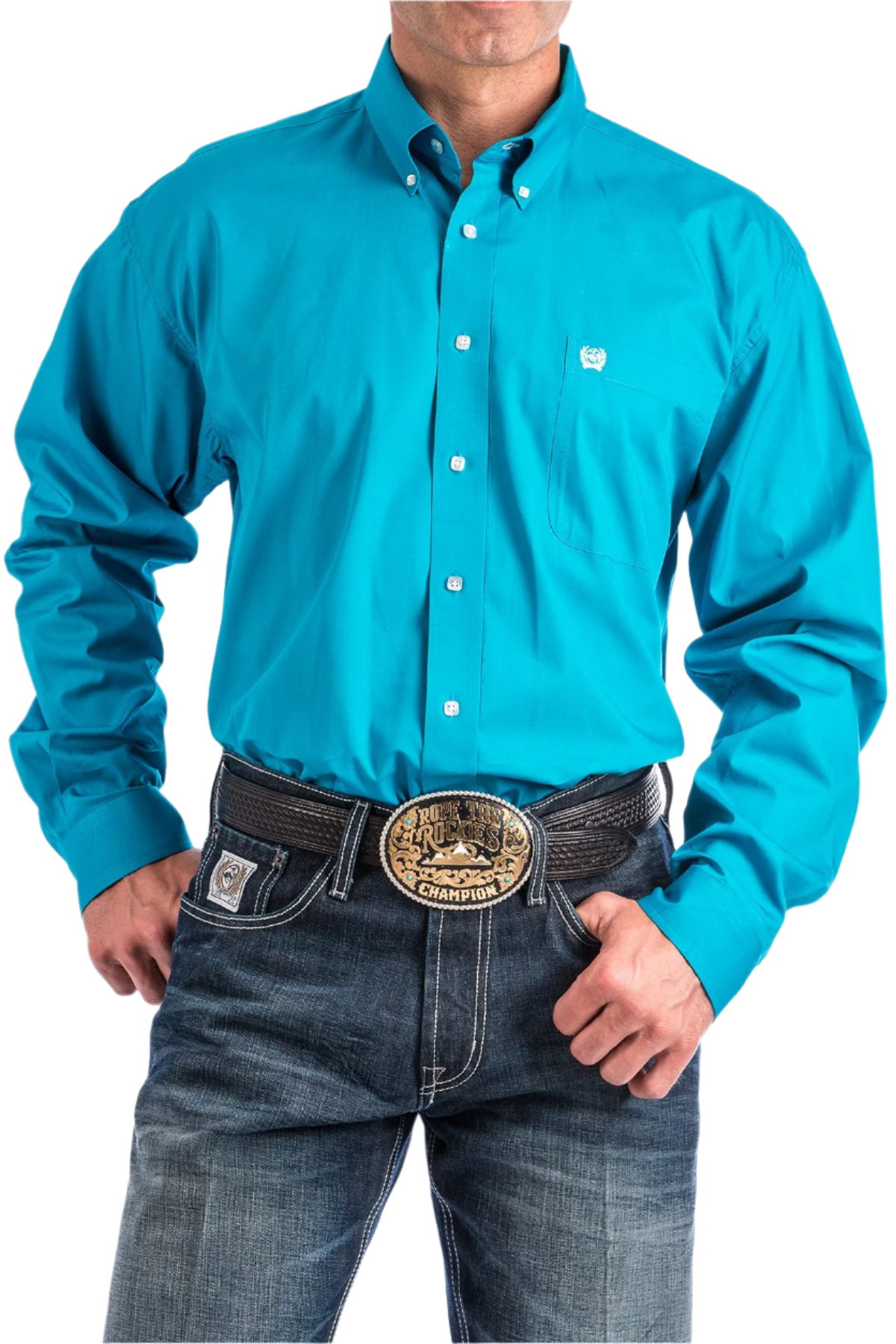 A man wearing a long-sleeve teal blue button-down shirt and blue jeans, with a belt and buckle visible.