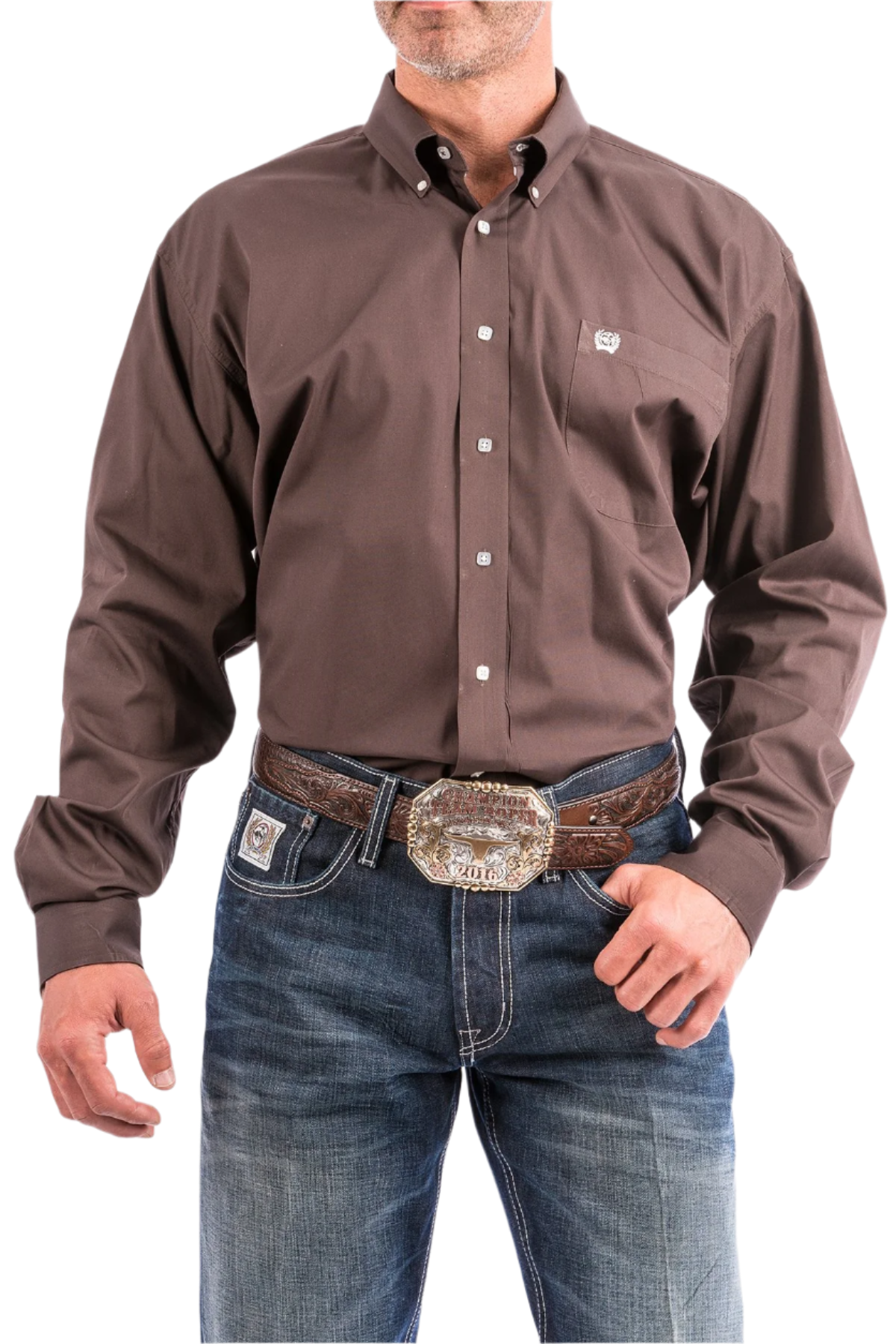 A man wearing a brown long-sleeve button-down shirt and blue jeans, with a belt and buckle visible.