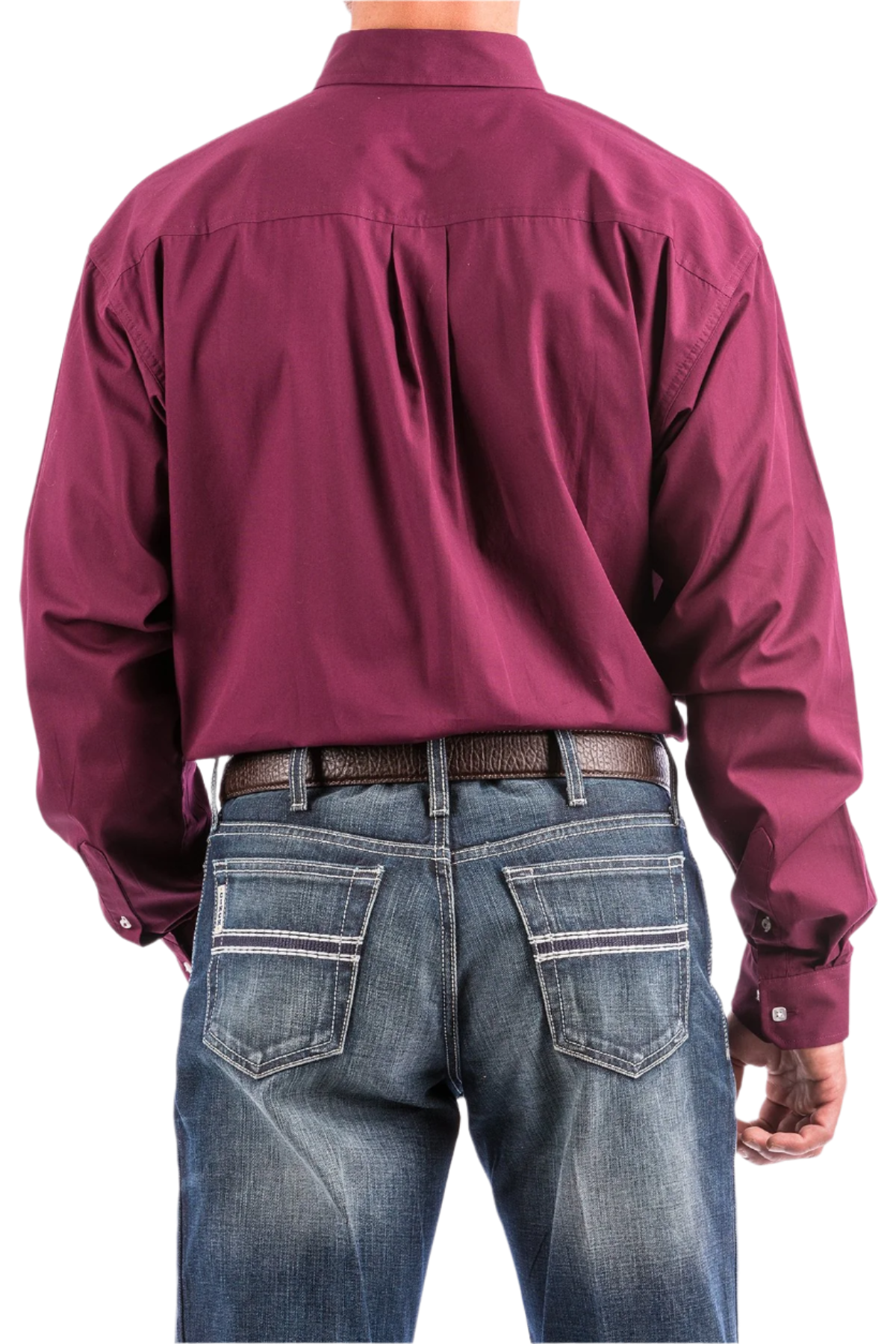 Back view of a man wearing a long sleeve burgundy solid color button-down shirt and blue jeans, with a belt and buckle visible.