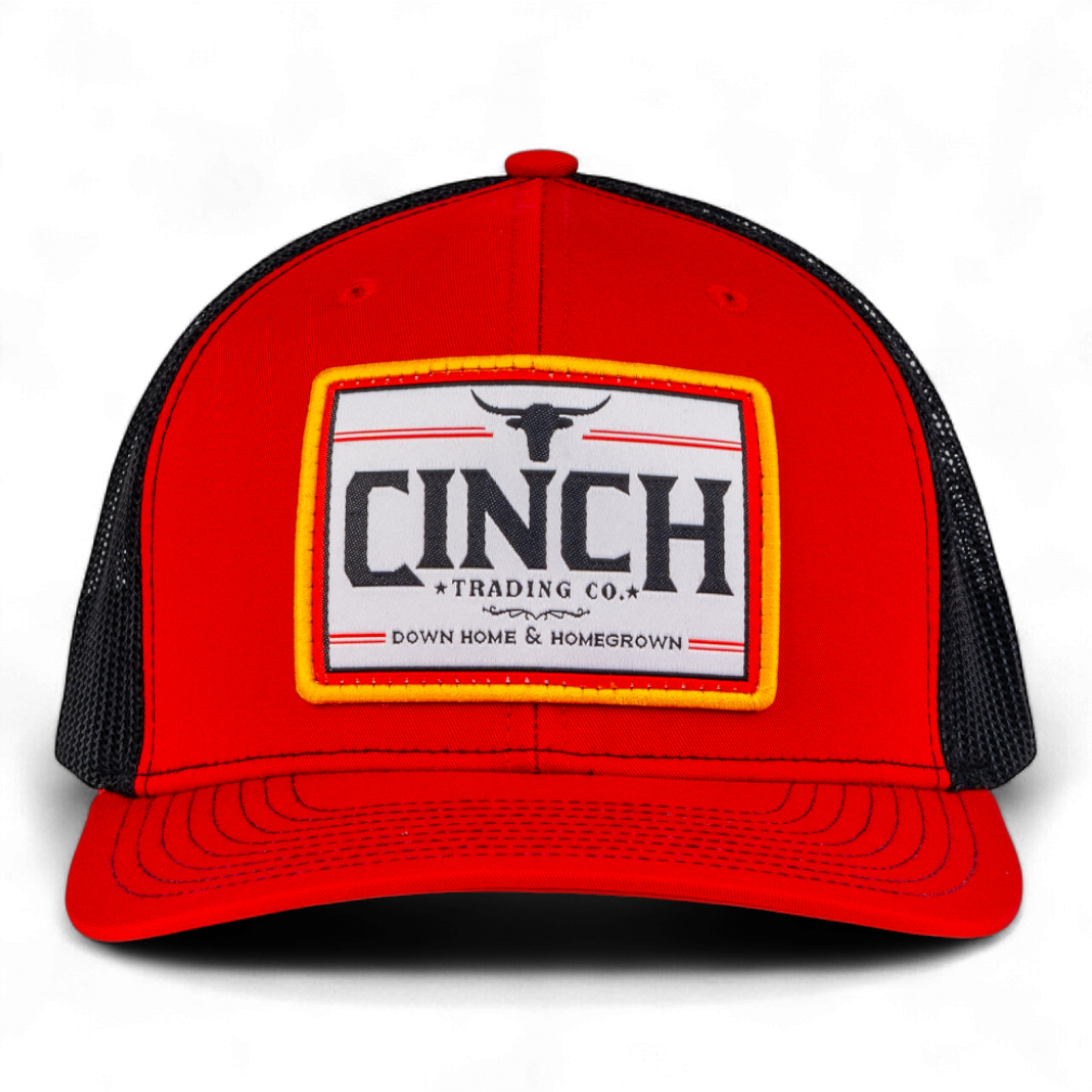 Red and black trucker cap with Cinch Trading Co logo on a white background