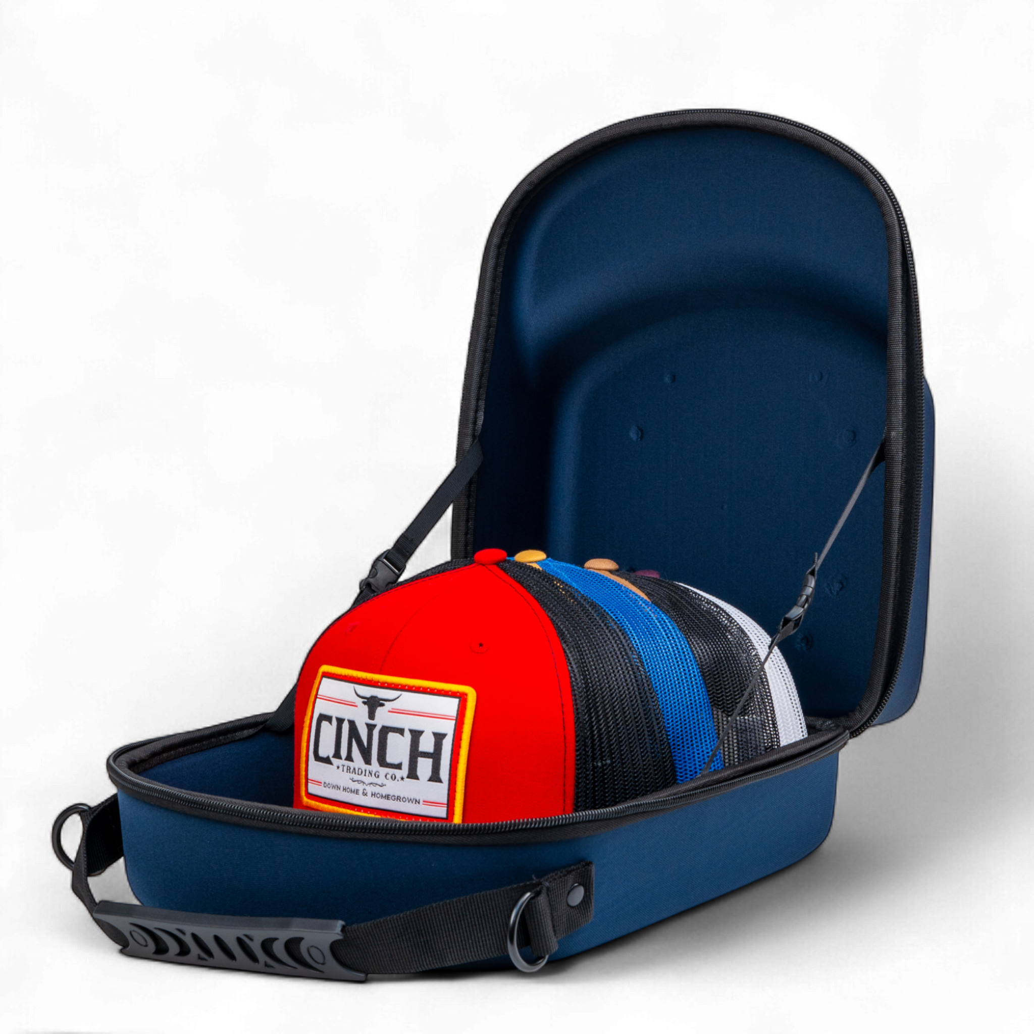 Blue carrying case with colorful hats inside, featuring the Cinch brand.