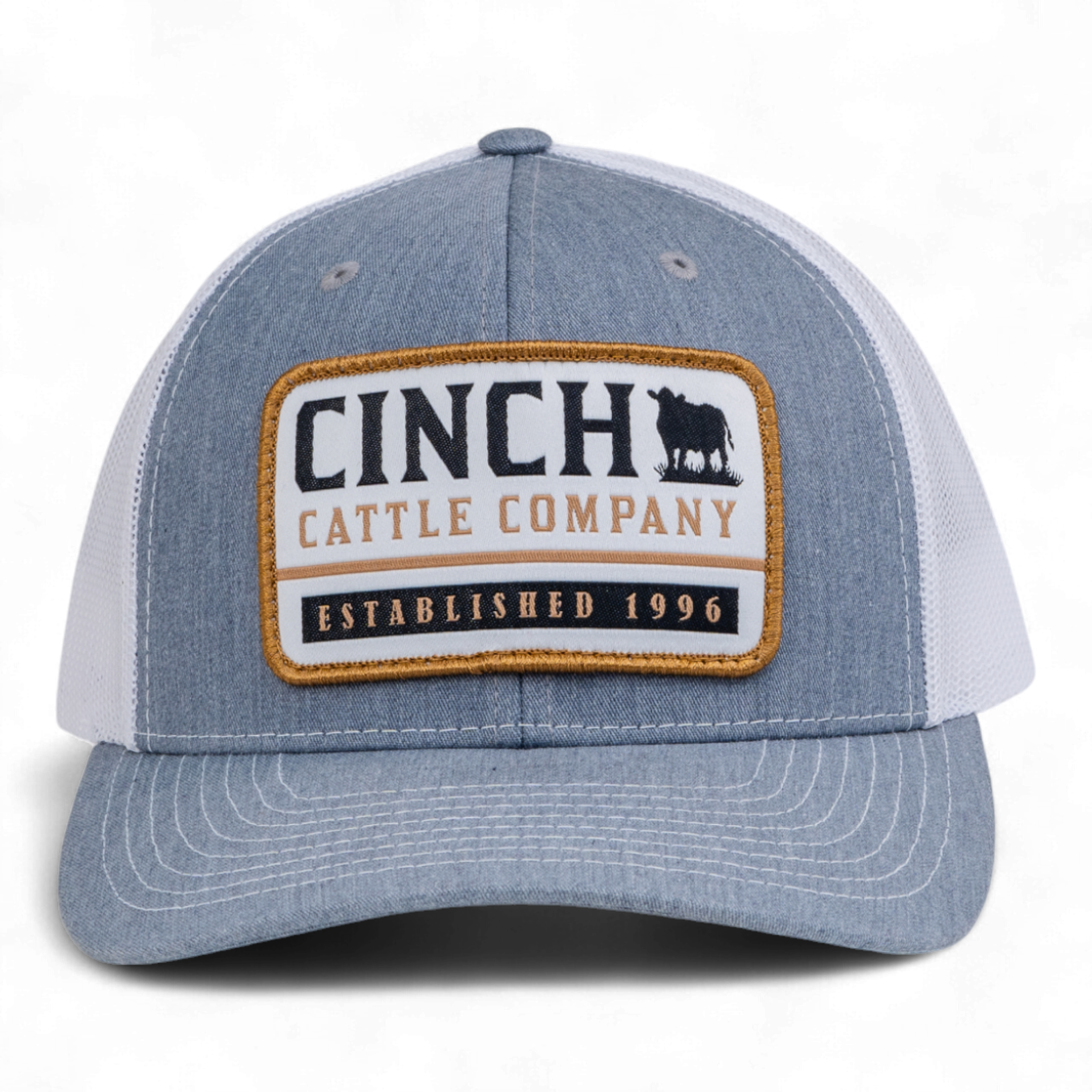 Blue and white cap with Cinch Cattle Company logo on a white background