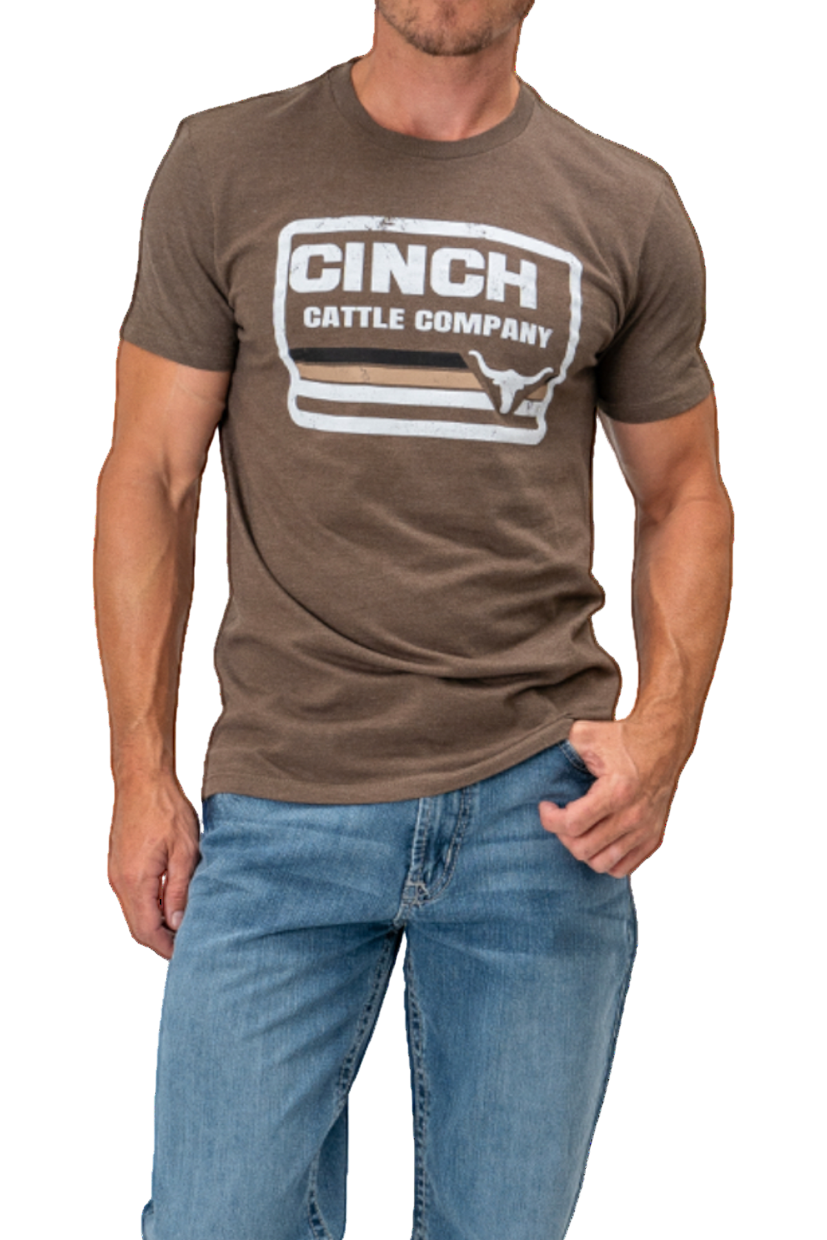 Man wearing a brown t-shirt with 'Cinch Cattle Company' logo and blue jeans on a white background