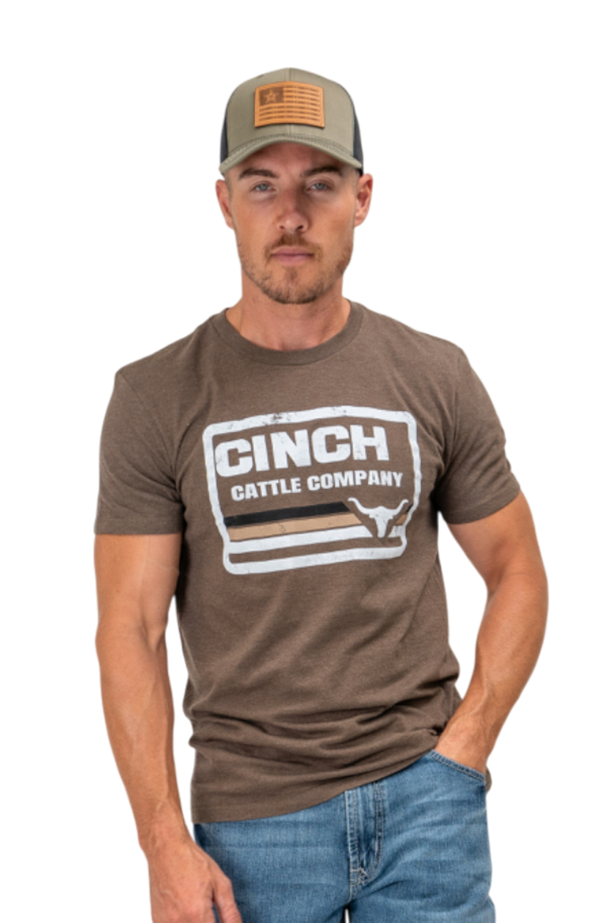 Man wearing a brown t-shirt with a large 'Cinch' graphic on the front, a hat, and blue jeans on a white background