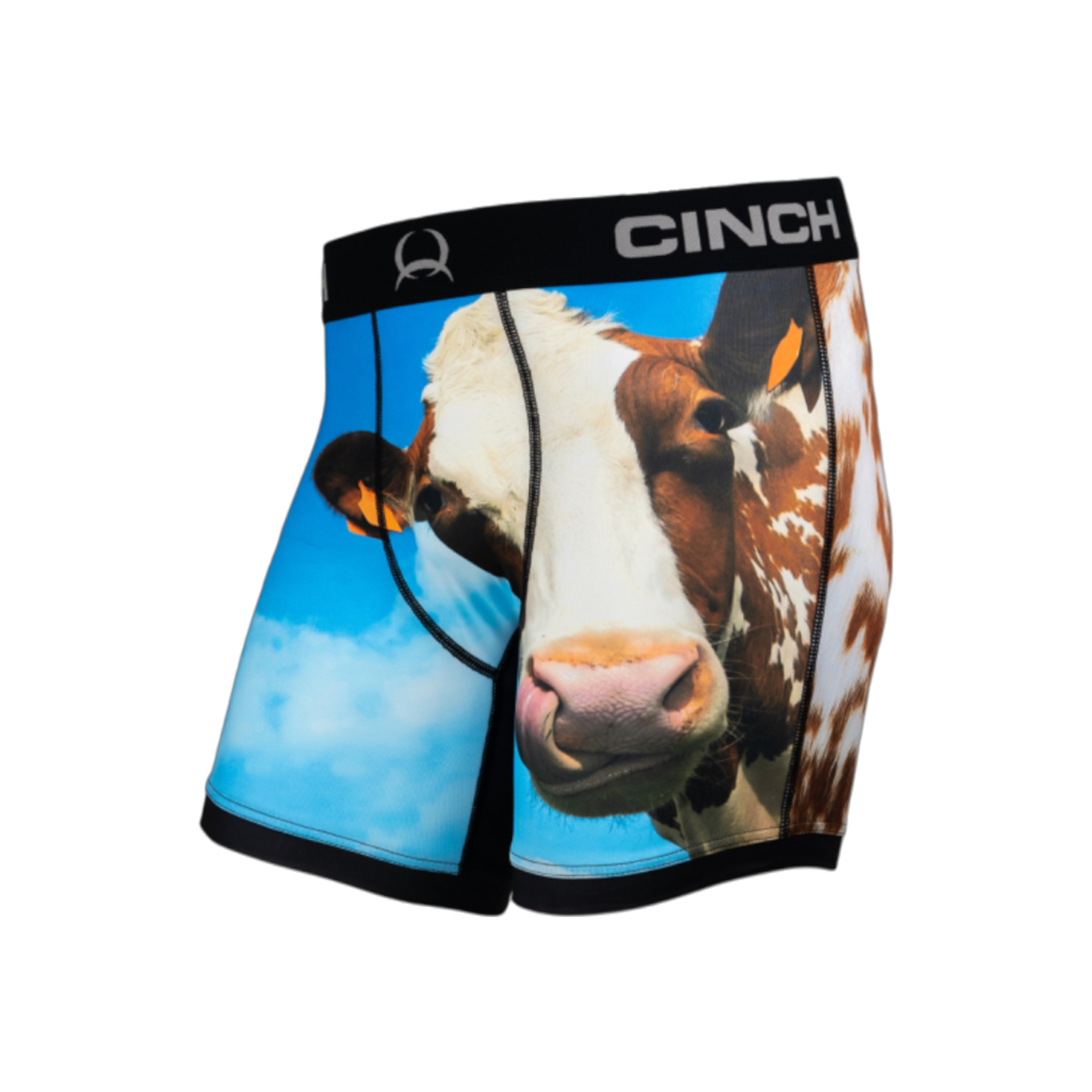 Side view of men's Cinch underwear with a black waistband, featuring a picture of a cow on a blue sky background on the front and an all-over cow print on the back