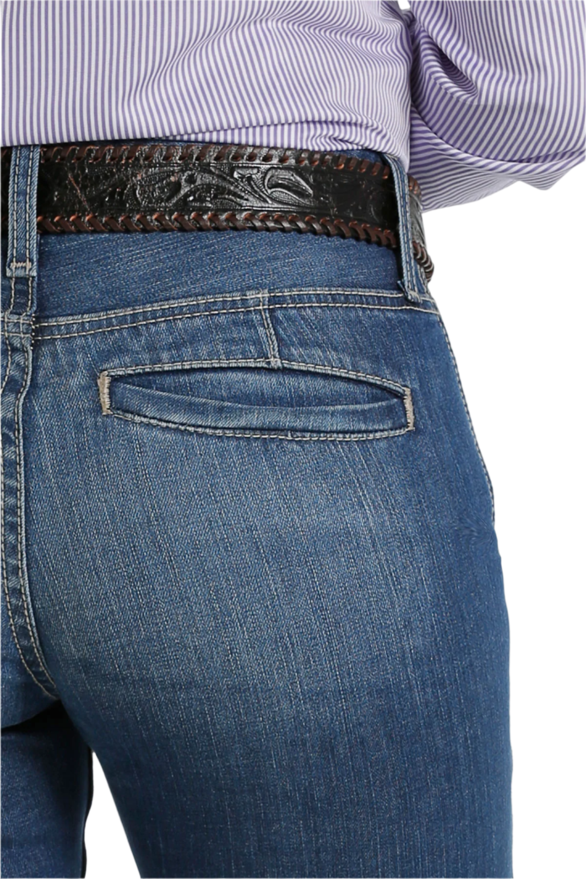Close-up back view of a pair of Cinch ladies slim trouser jeans  in a medium stonewash color, including a belt