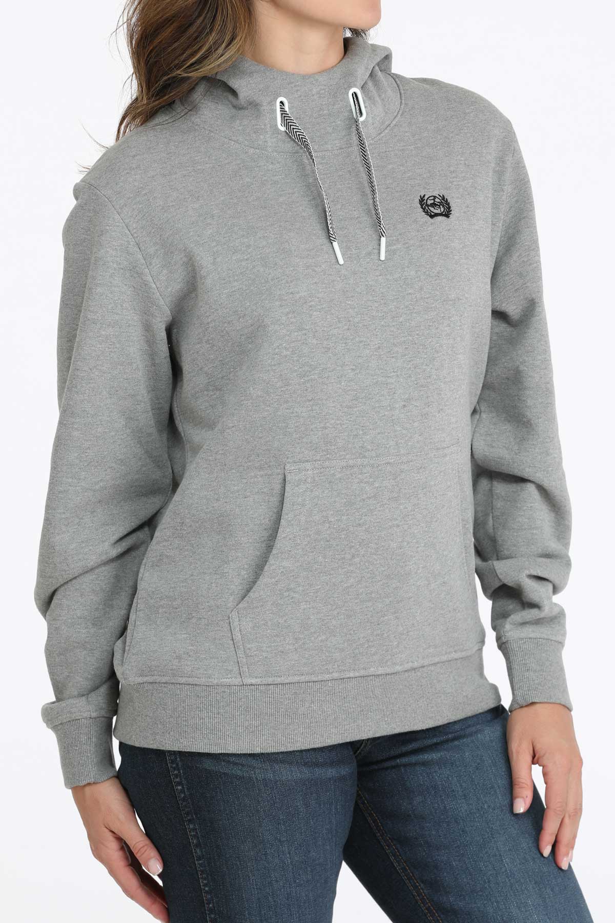 Gray hoodie worn by a person on a white background