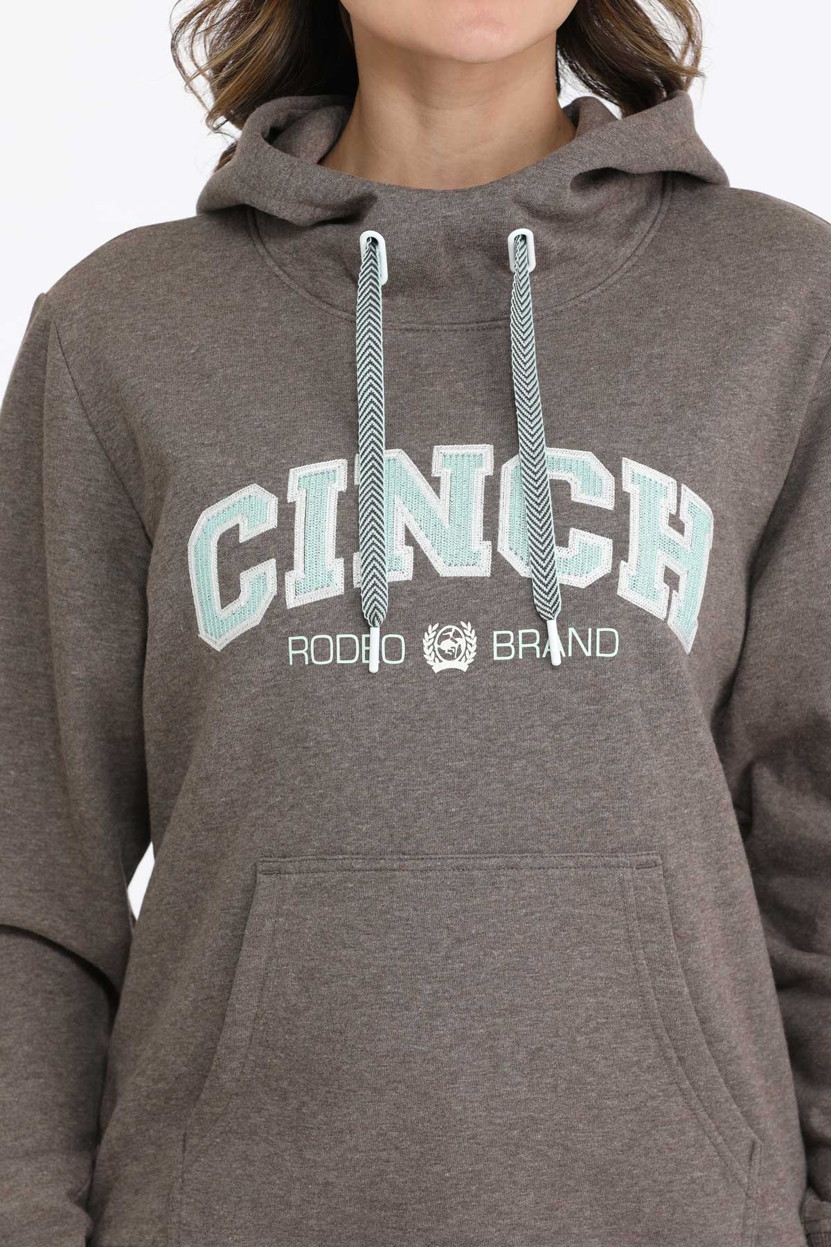 Brown hoodie with 'Cinch Rodeo Brand' logo on a plain background