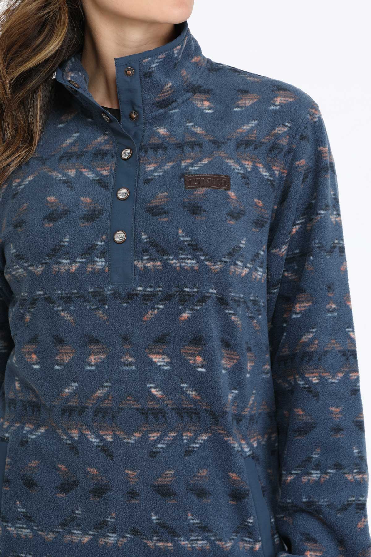 Close-up of a woman wearing a blue fleece pullover