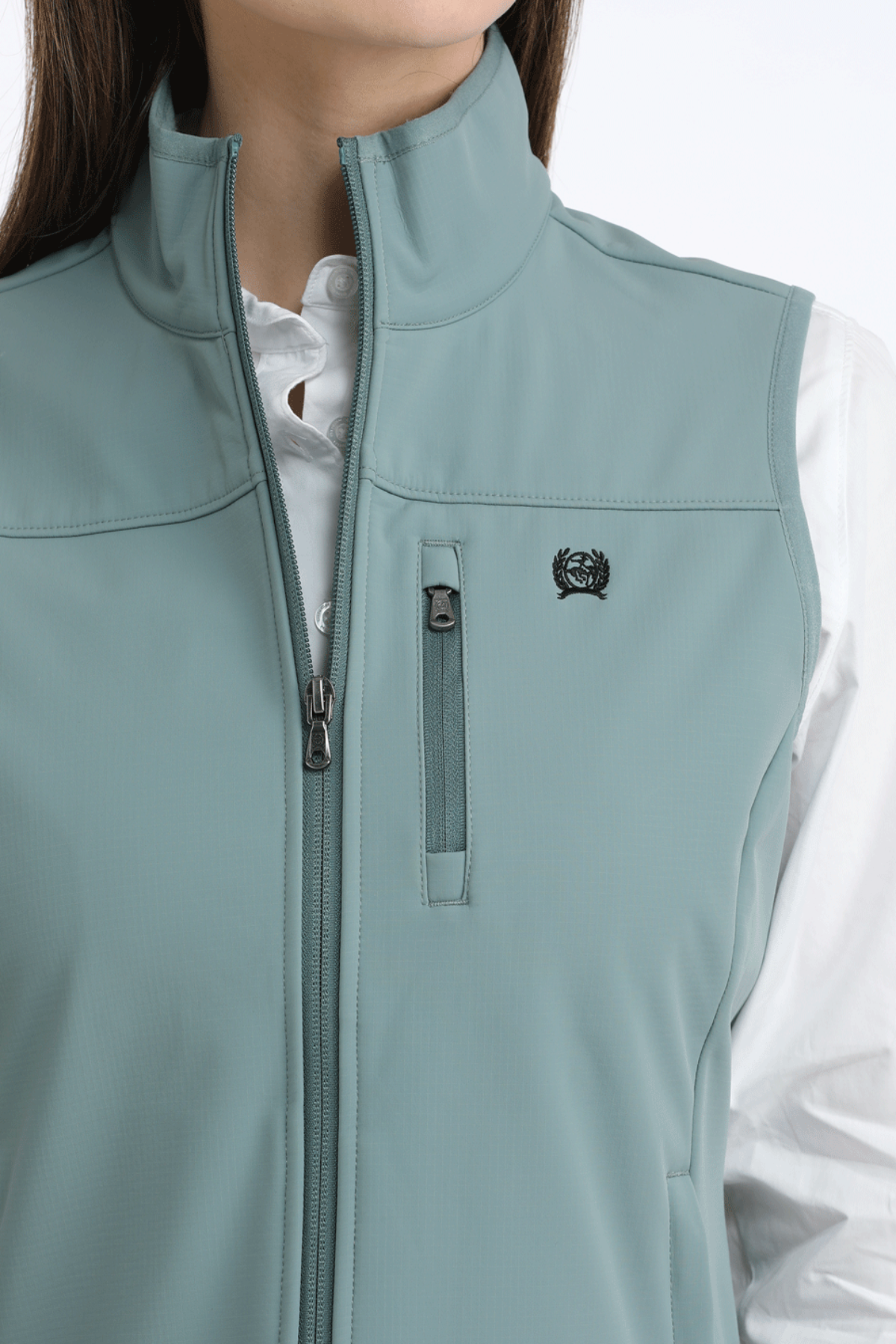 Light blue vest with a brand logo worn by a person on a white background