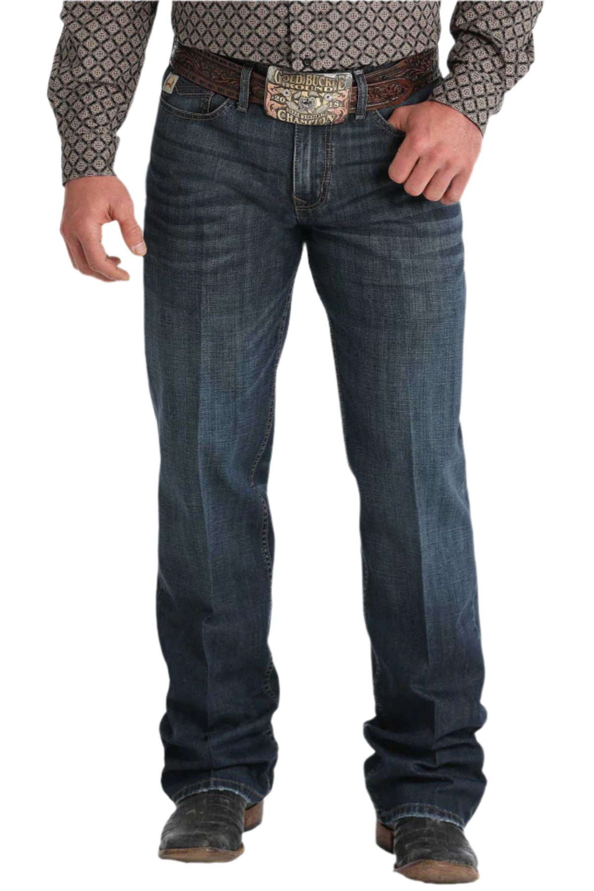 Man wearing dark wash Cinch jeans with a patterned shirt and belt buckle