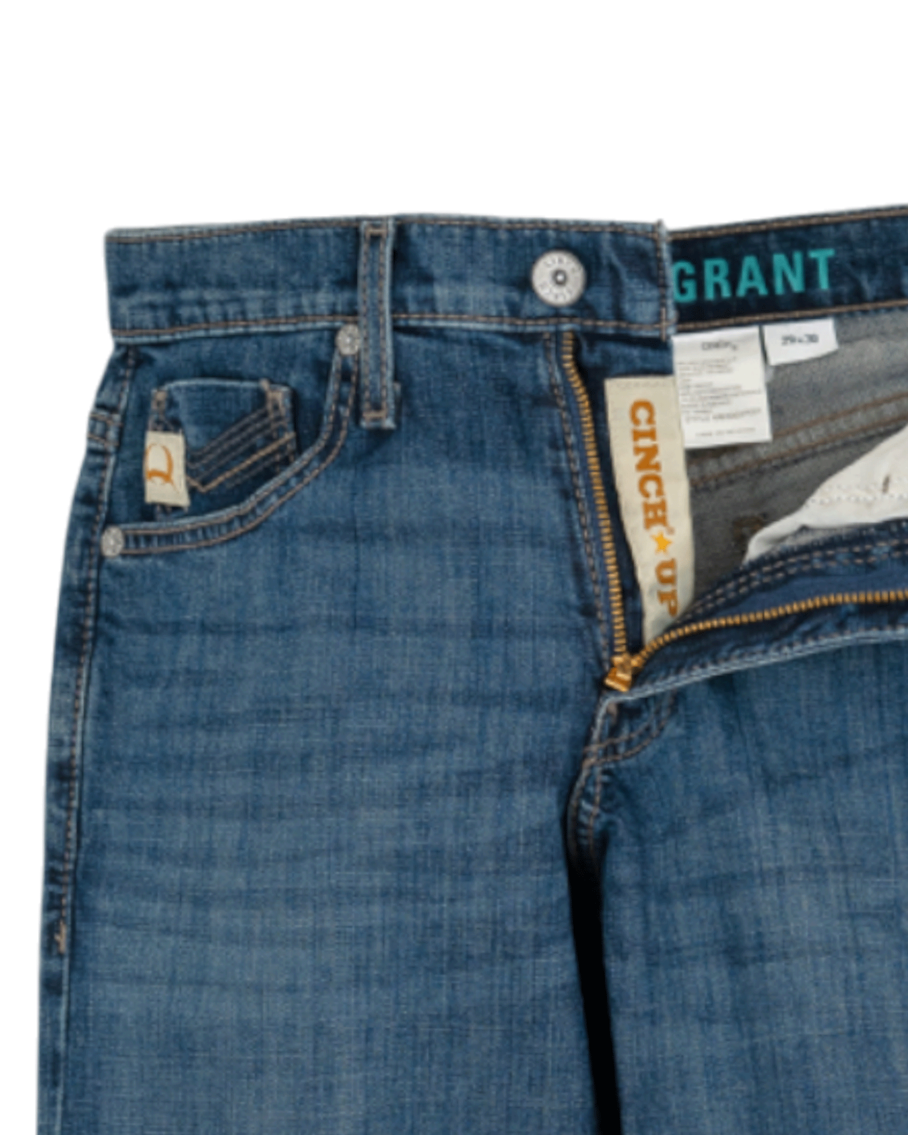 Close-up of the front of blue denim jeans with light fading, featuring a coin pocket with a small embroidered patch, belt loops, and a button closure with a zipper fly