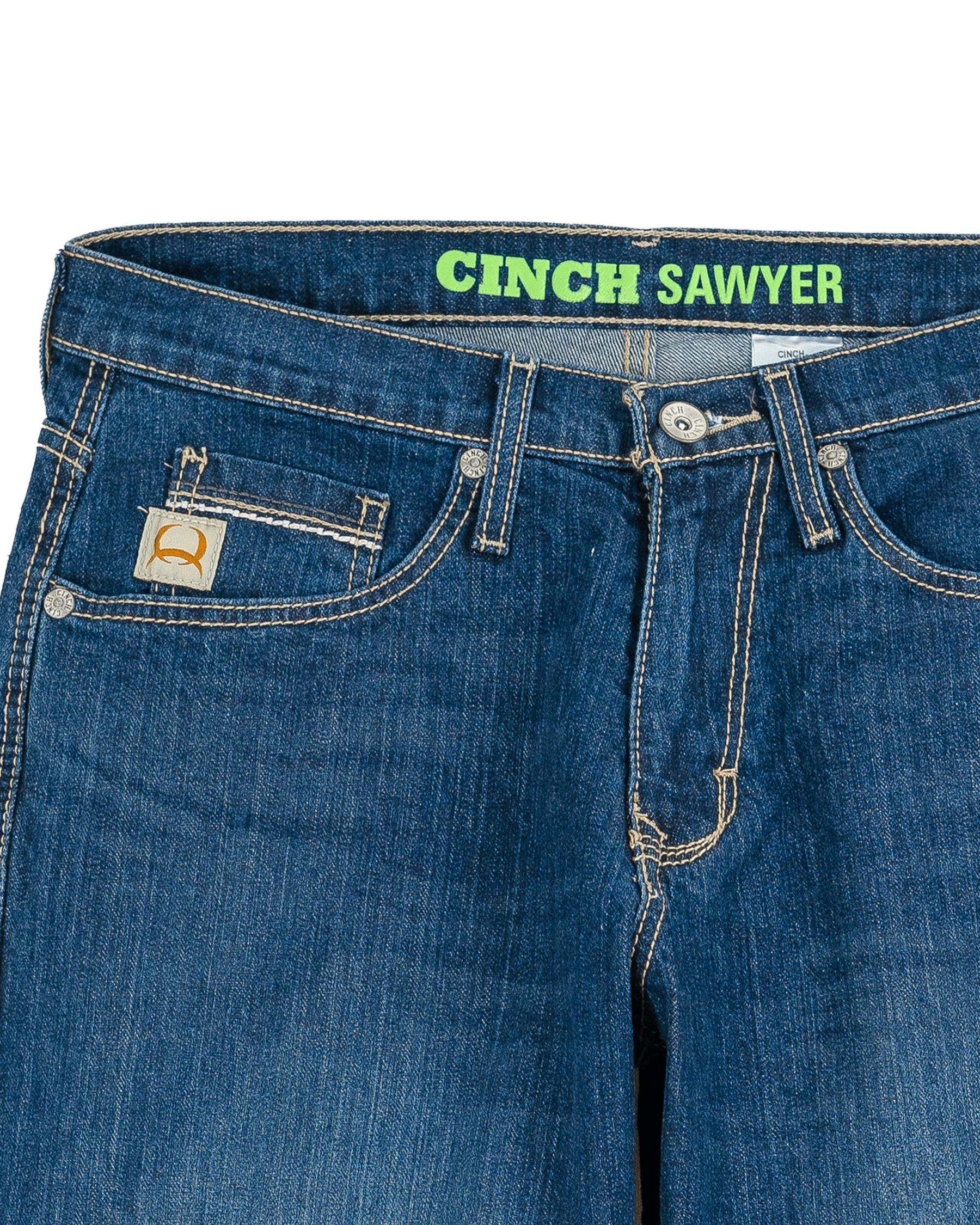 Close-up of blue jeans with 'Cinch Sawyer' branding on a white background