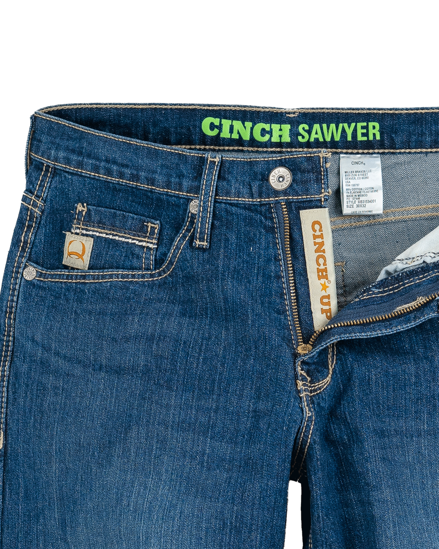 Close-up of blue jeans with 'Cinch Sawyer' branding on a white background