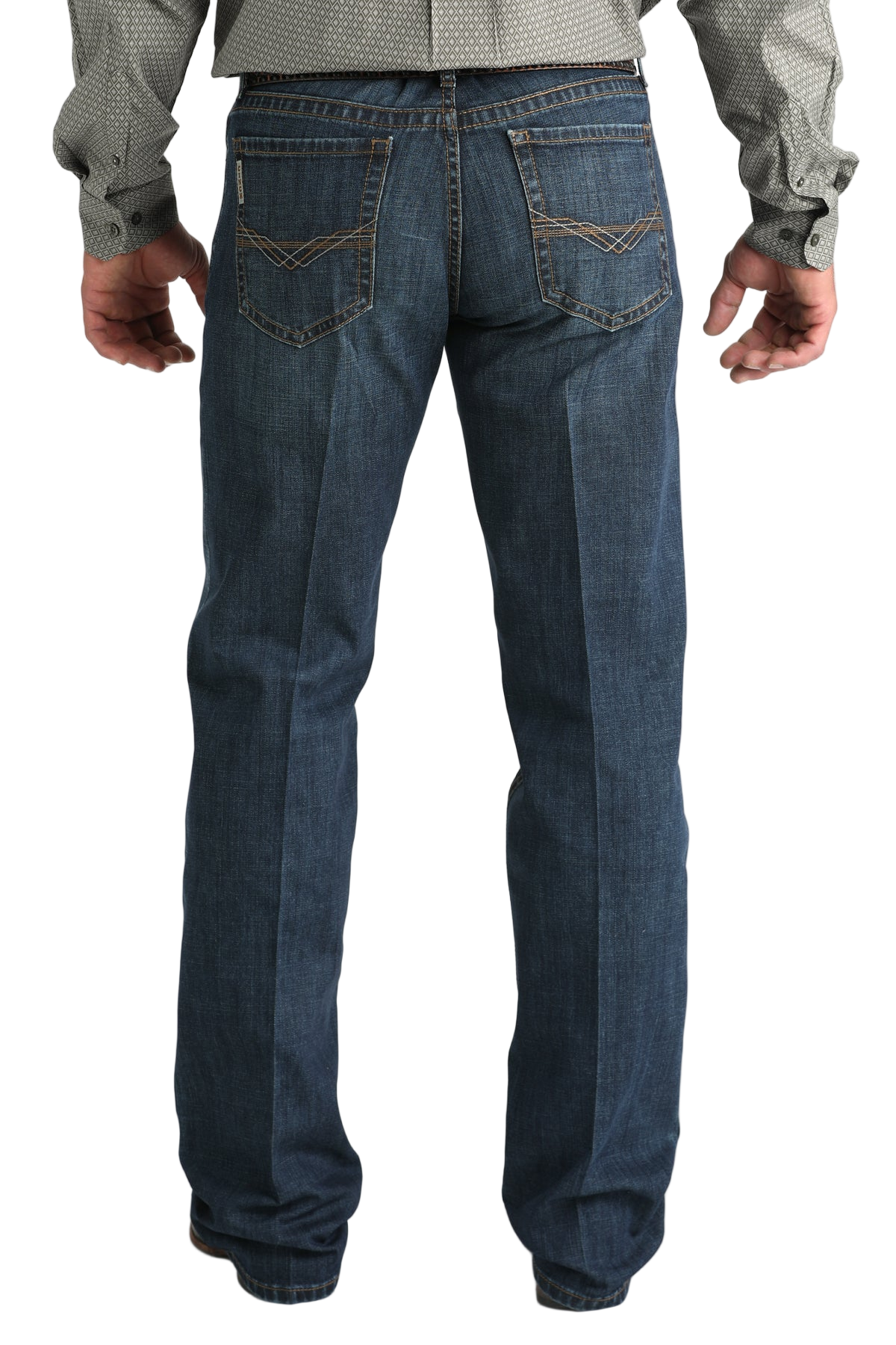 Blue jeans worn by a person on a white background