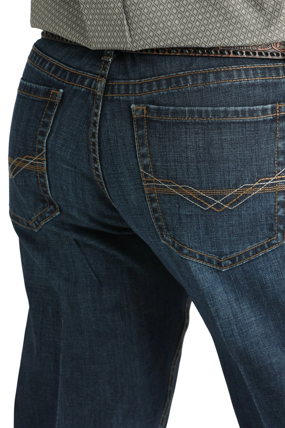 Close-up of blue jeans with a white background