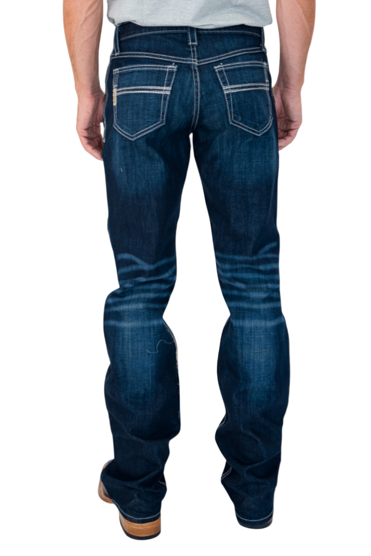 Person wearing blue jeans on a white background