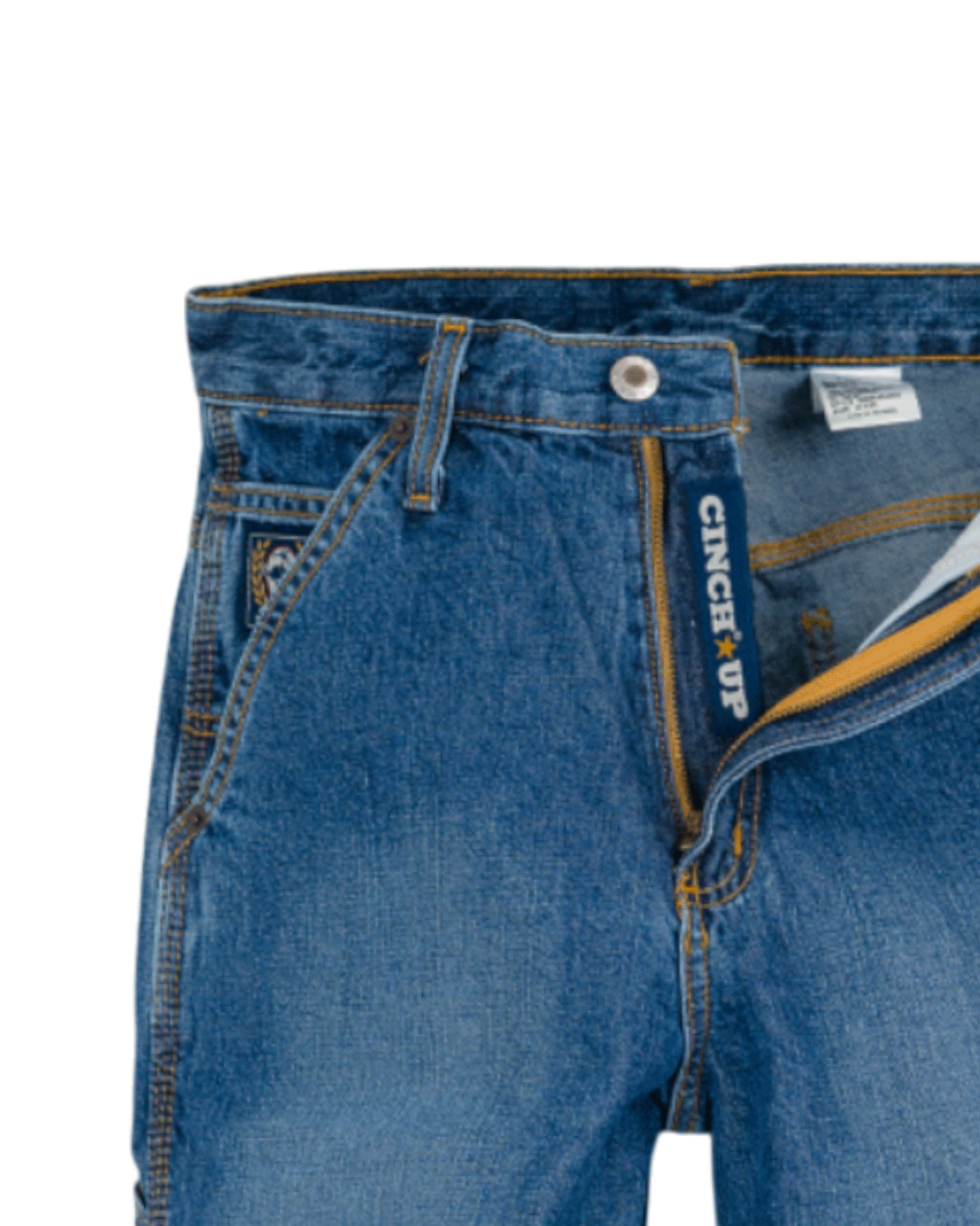 Close-up of blue jeans with a visible brand label on a white background