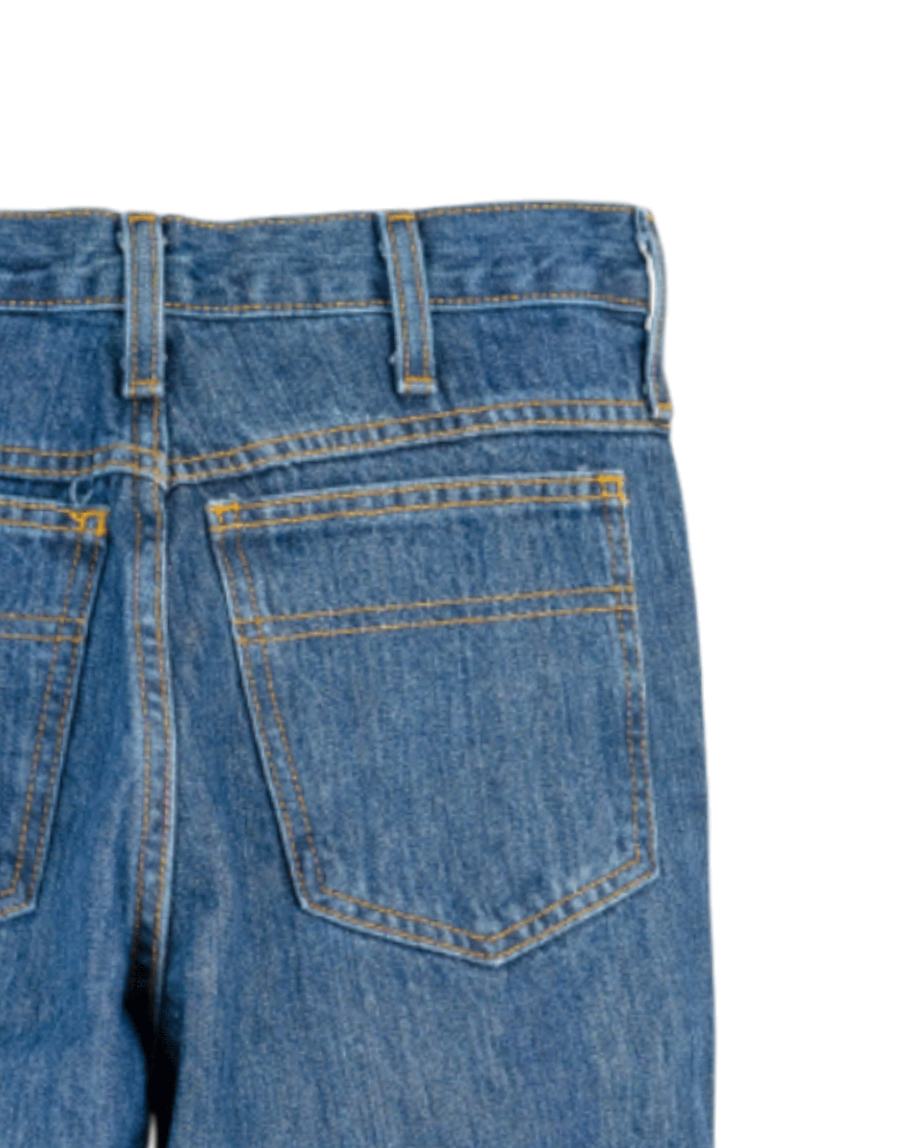 Close-up of blue jeans with a pocket on a white background