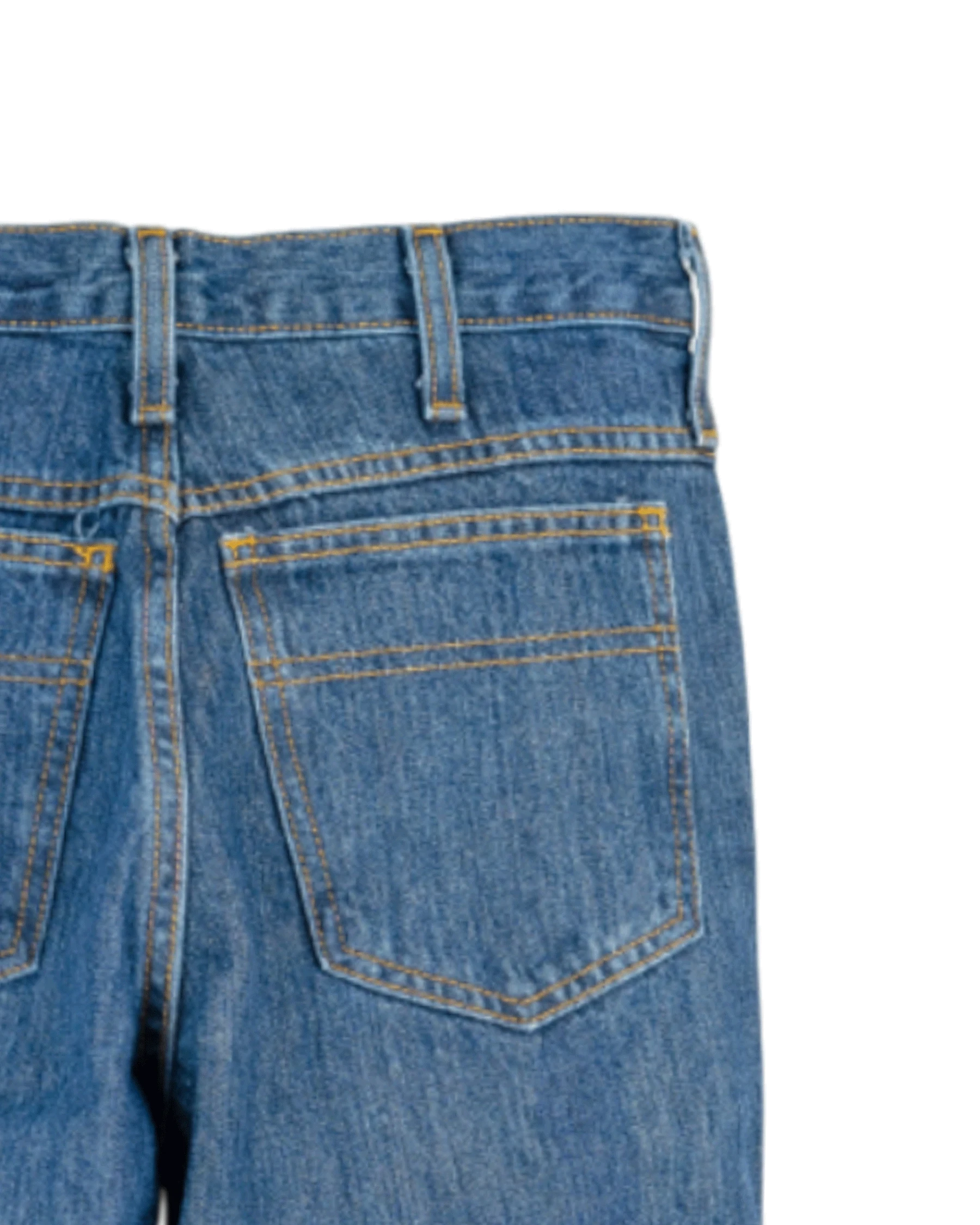 Close-up of blue jeans with a pocket on a white background