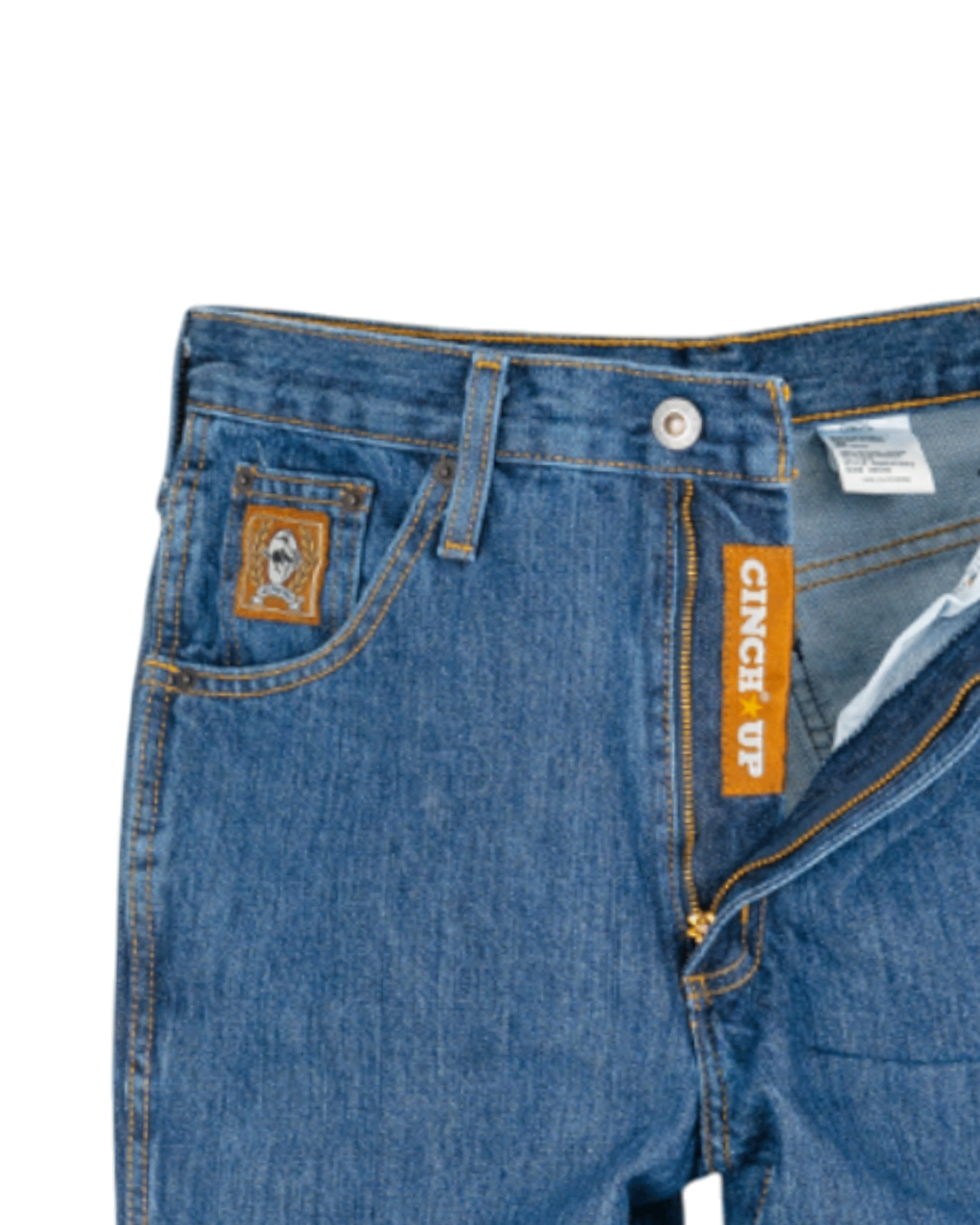Close-up of blue jeans with a brand label on a white background