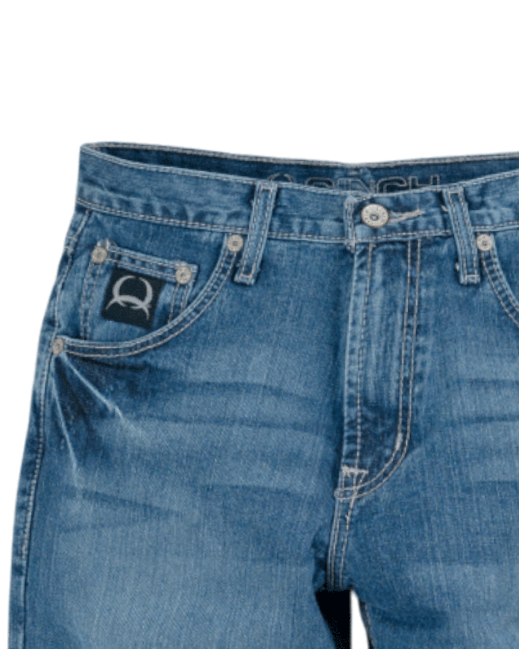 Close-up of blue jeans with a brand logo on a white background