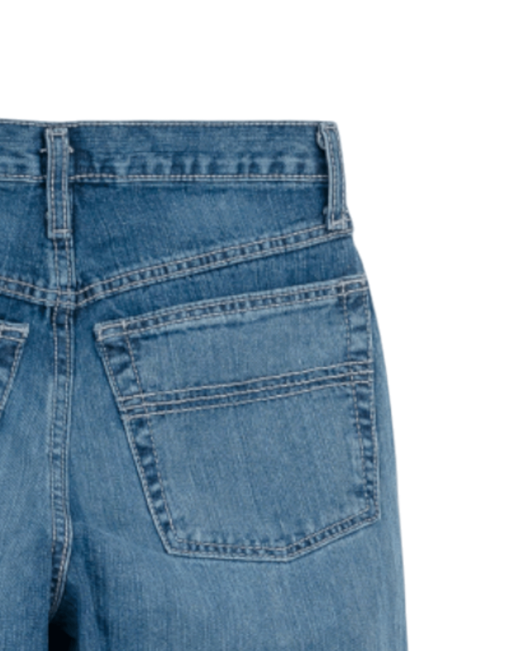 Close-up of blue denim jeans on a white background