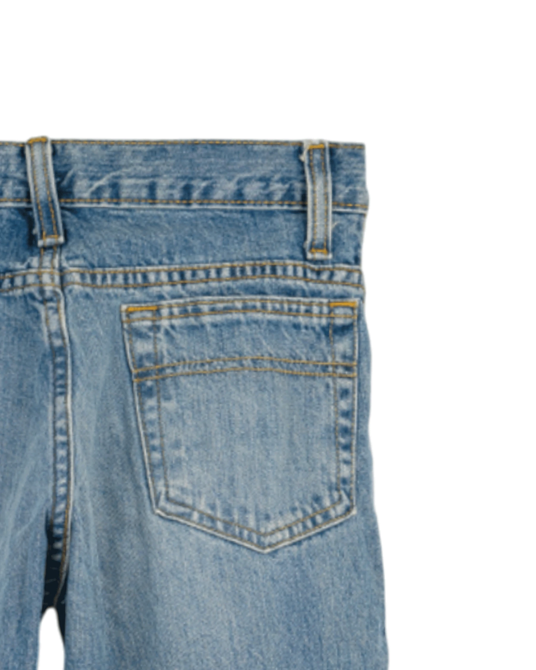Close-up of a blue denim jeans pocket on a white background