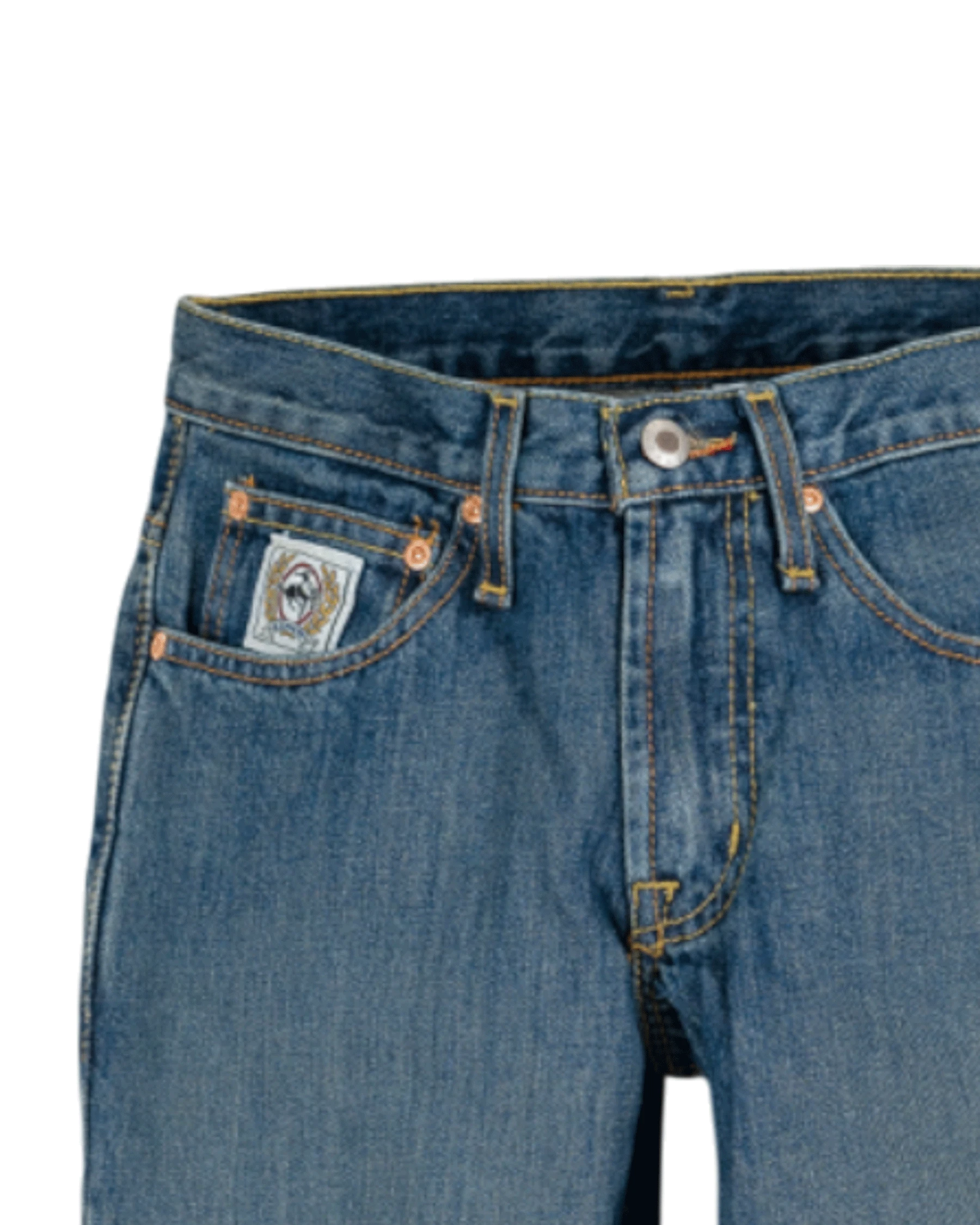 Close-up of blue jeans with a brand label on a white background