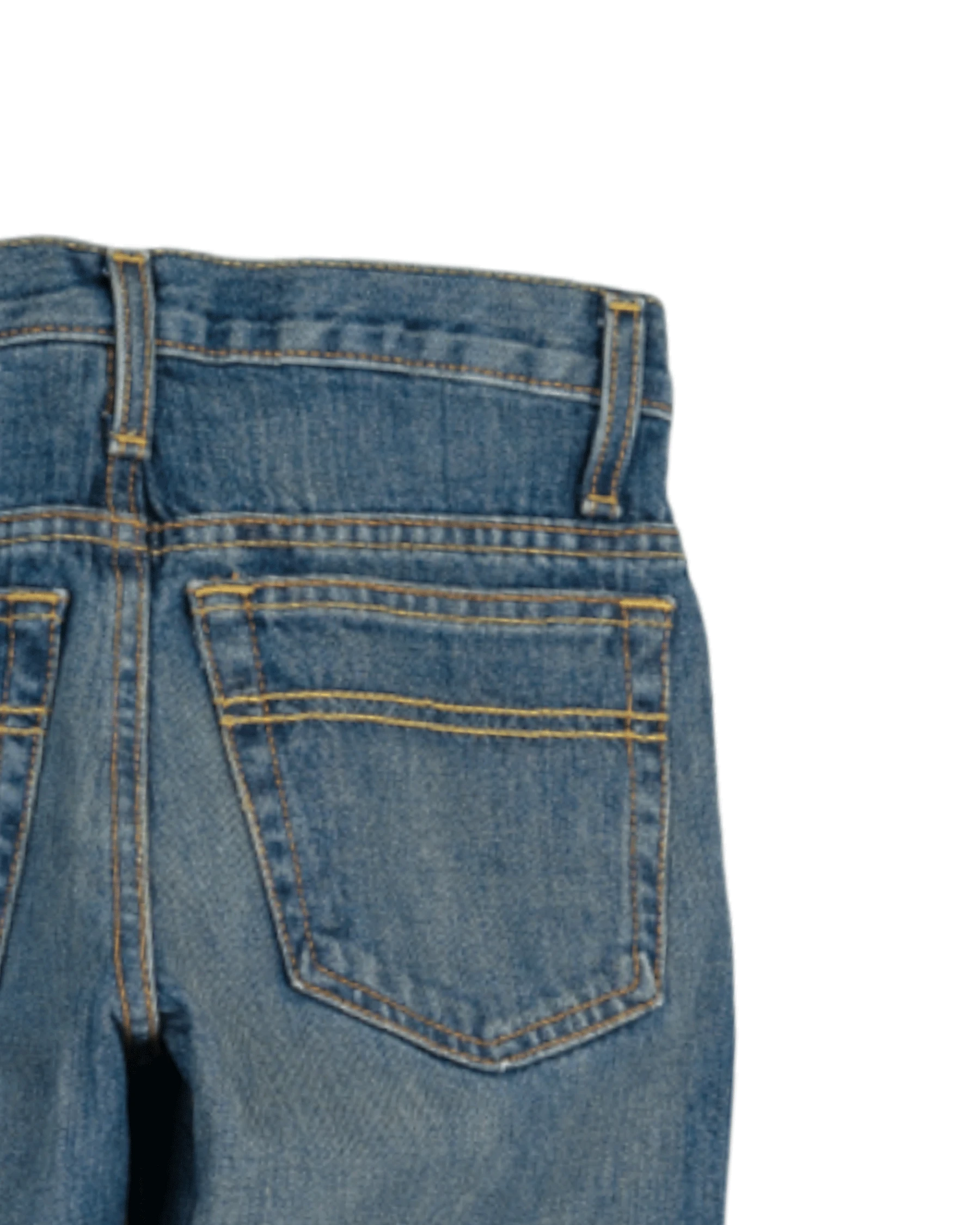 Close-up of blue jeans with a pocket on a white background