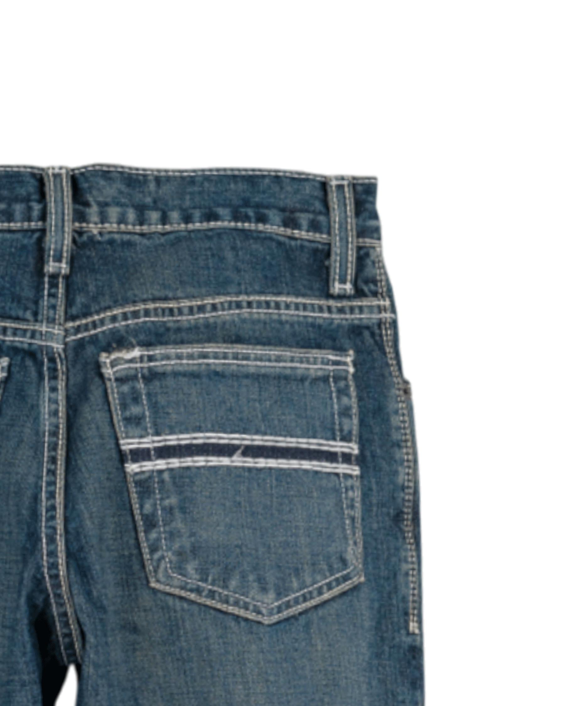 Close-up of blue denim jeans on a white background