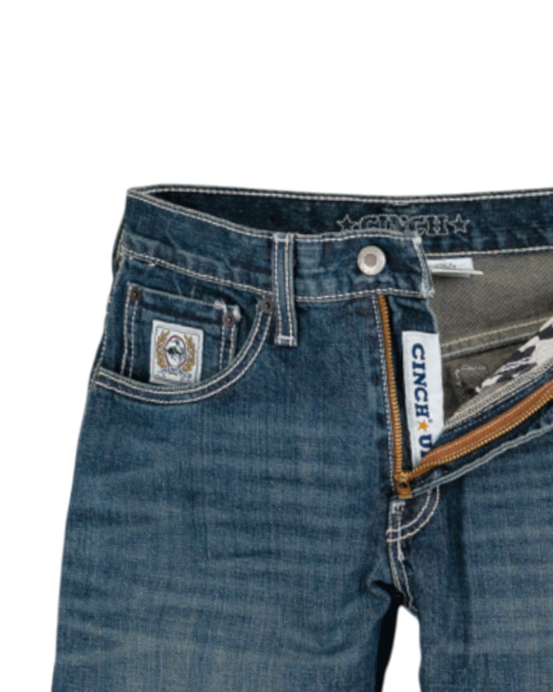 Close-up of blue jeans with Cinch branding on a white background
