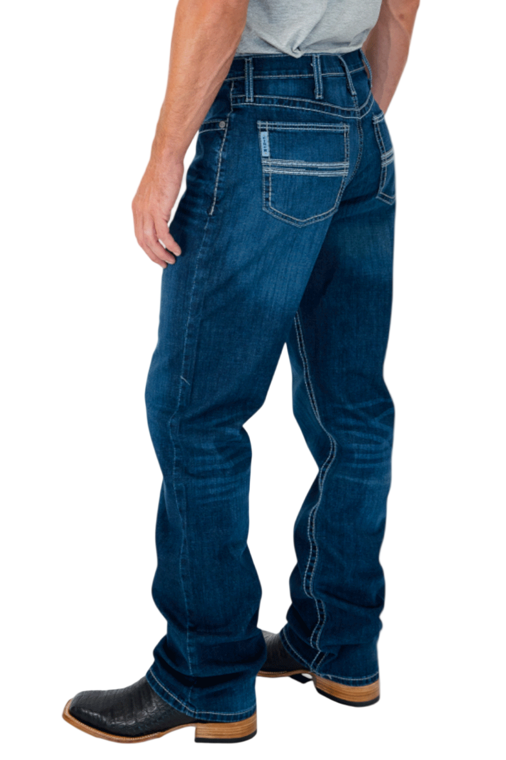 Person wearing blue jeans on a white background