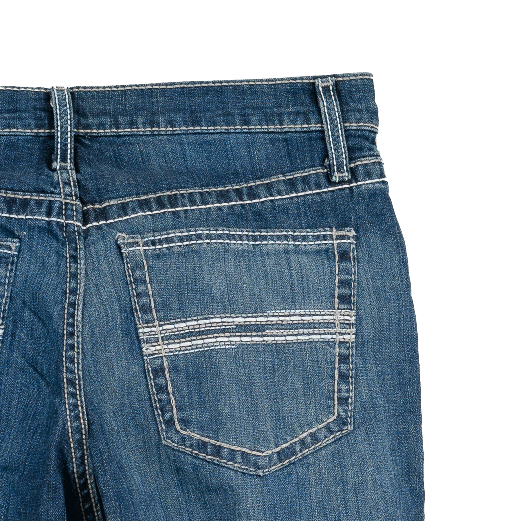 Close-up of blue denim jeans with a pocket on a white background