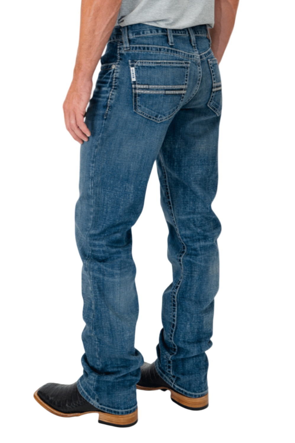 Person wearing blue jeans on a white background