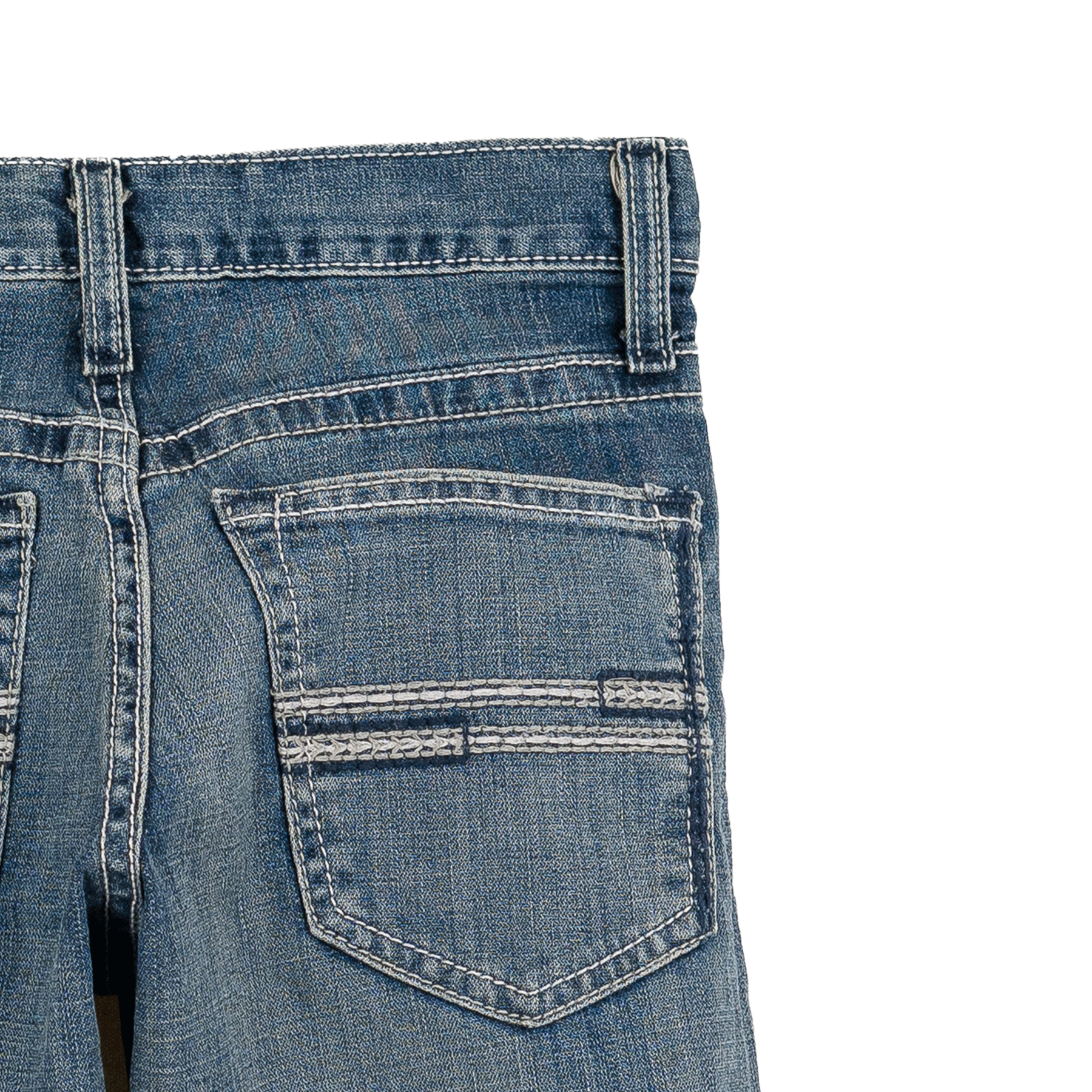 Close-up of blue denim jeans with a pocket on a white background