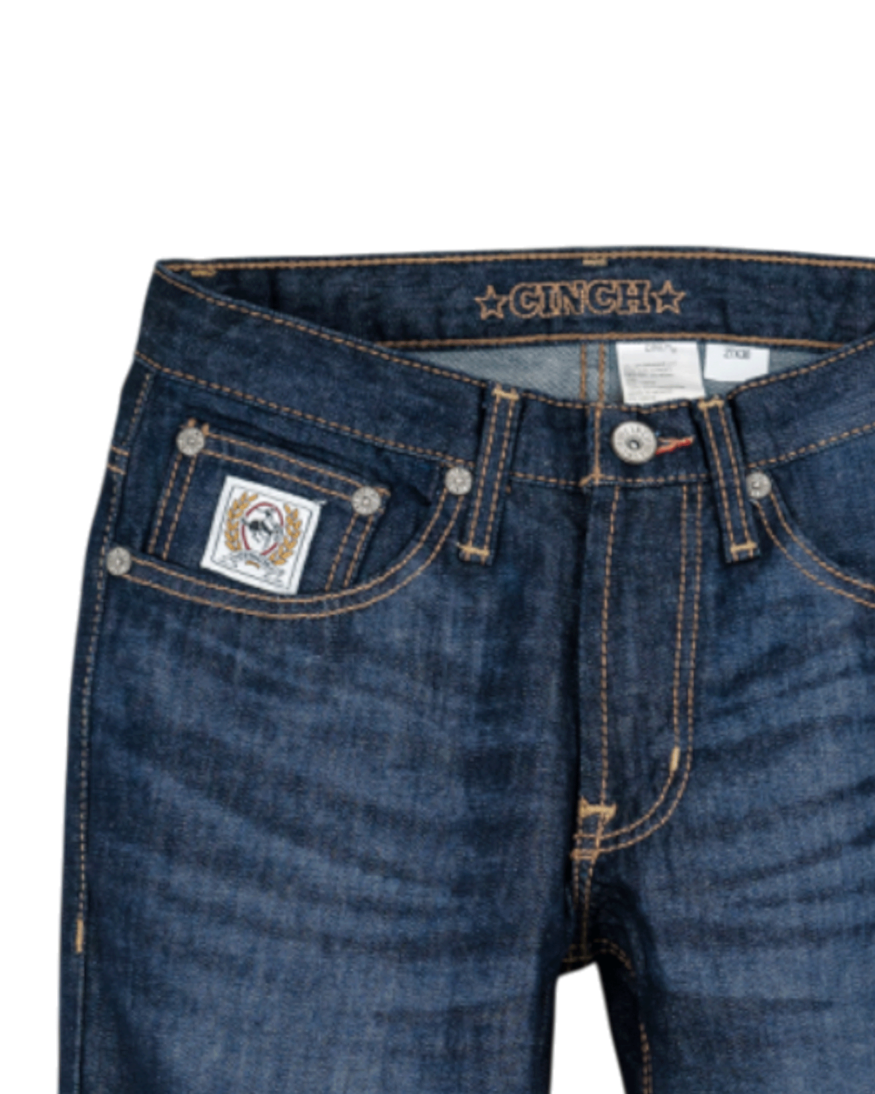 Close-up of blue jeans with visible branding on a white background
