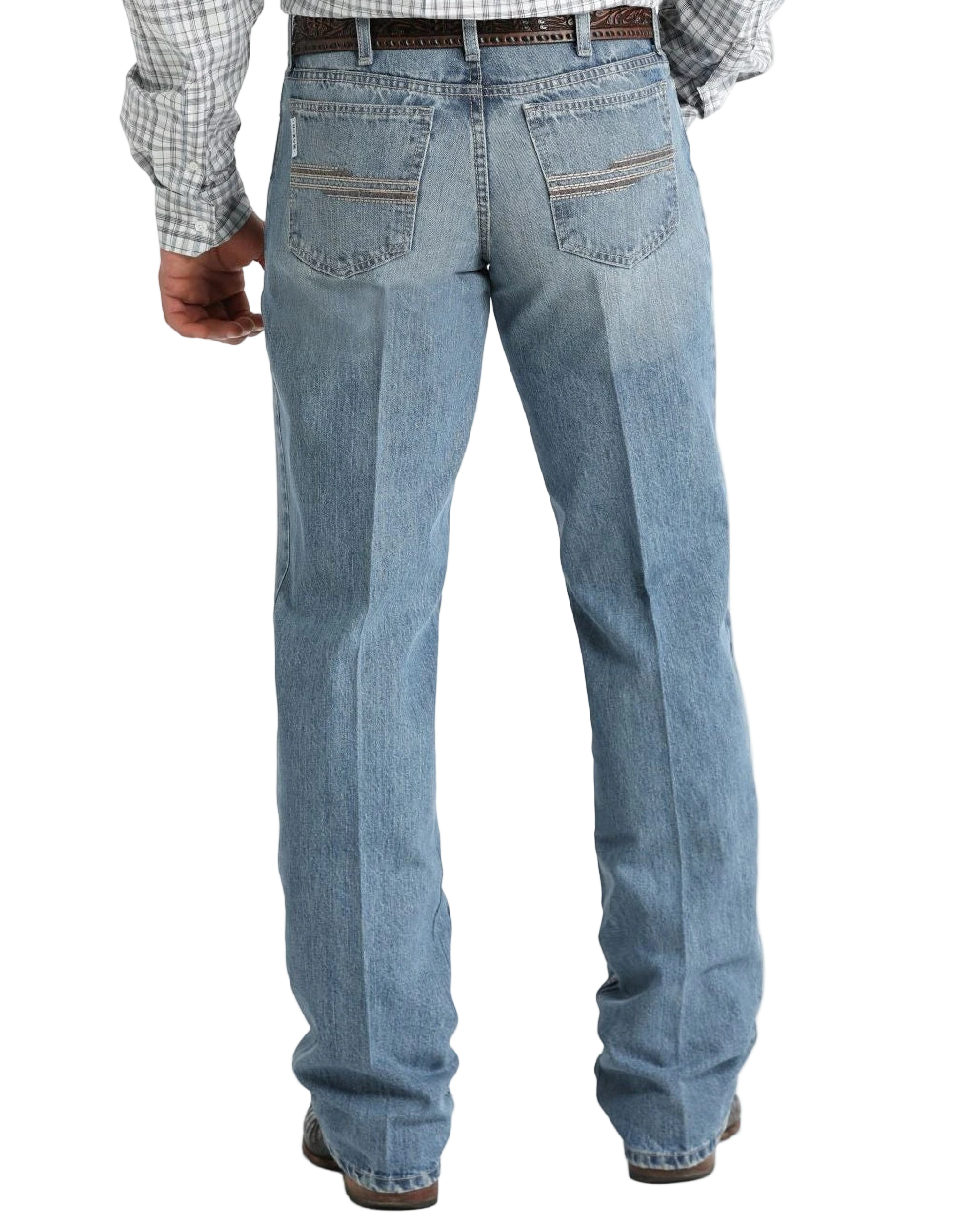 Back view of a man wearing light-wash blue jeans with stitched back pockets and a patterned brown belt