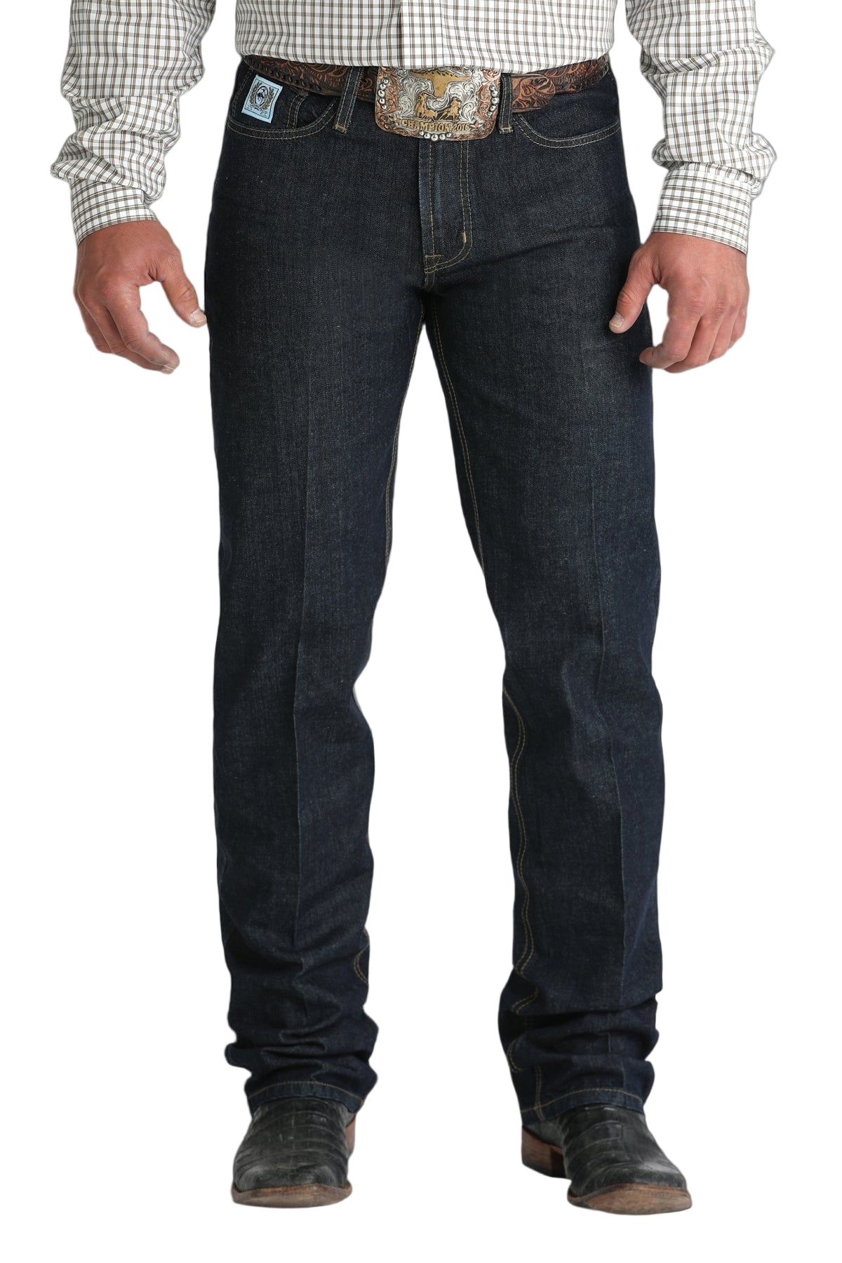 Front view of a man wearing dark blue denim jeans, and a belt, with a tucked-in patterned shirt and boots
