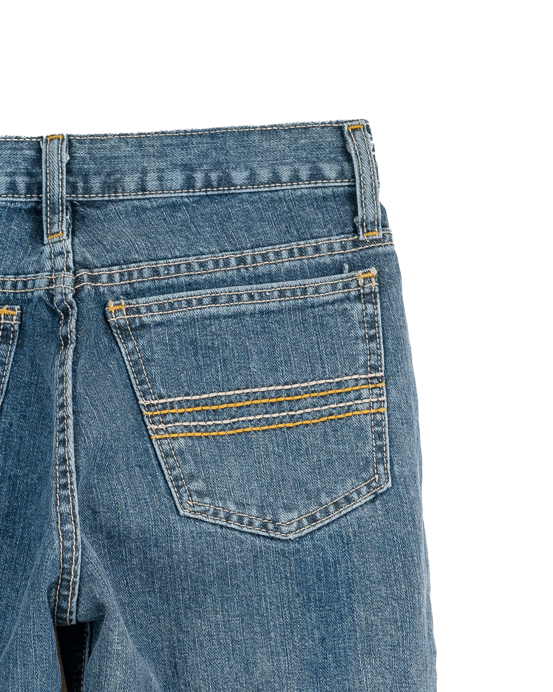 Close-up of blue jeans back pocket on a white background
