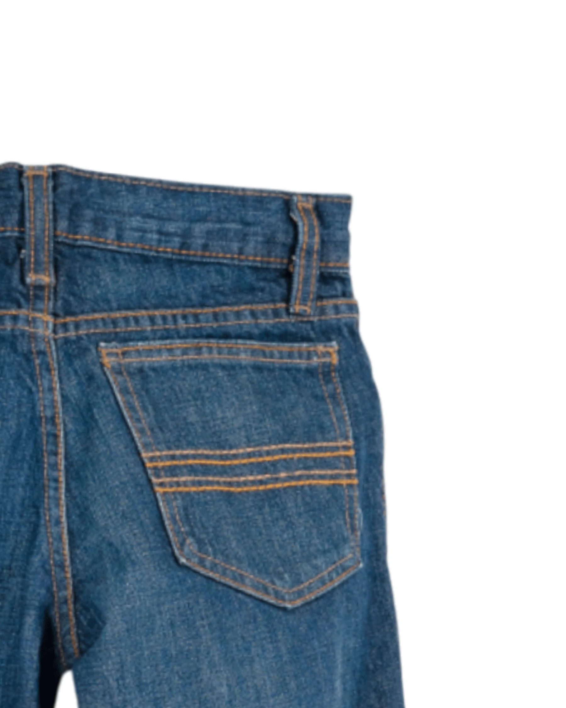 Close-up of blue jeans with a pocket on a white background