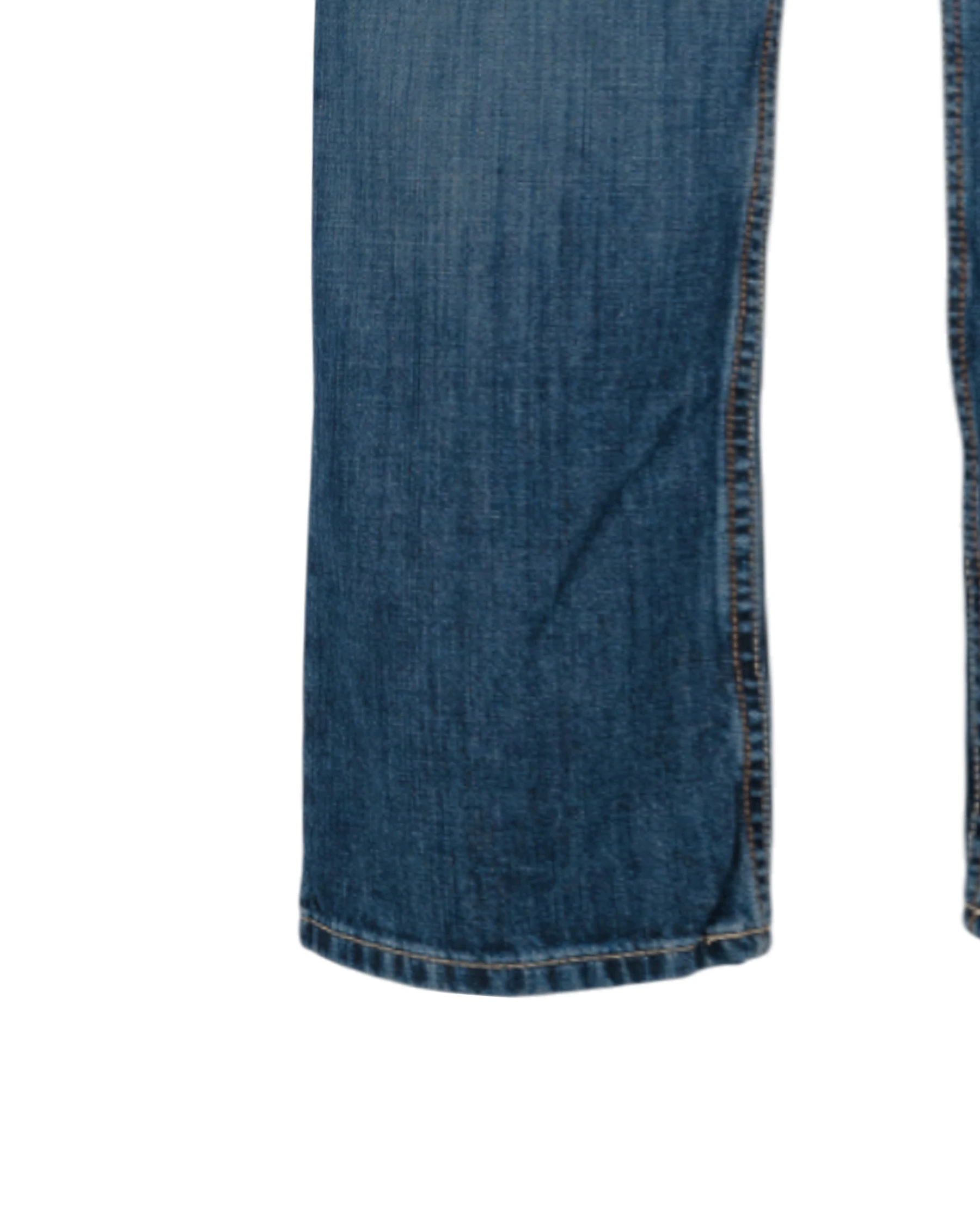 Close-up view of the bottom portion of a pair of blue jeans, specifically looking at the bottom right leg