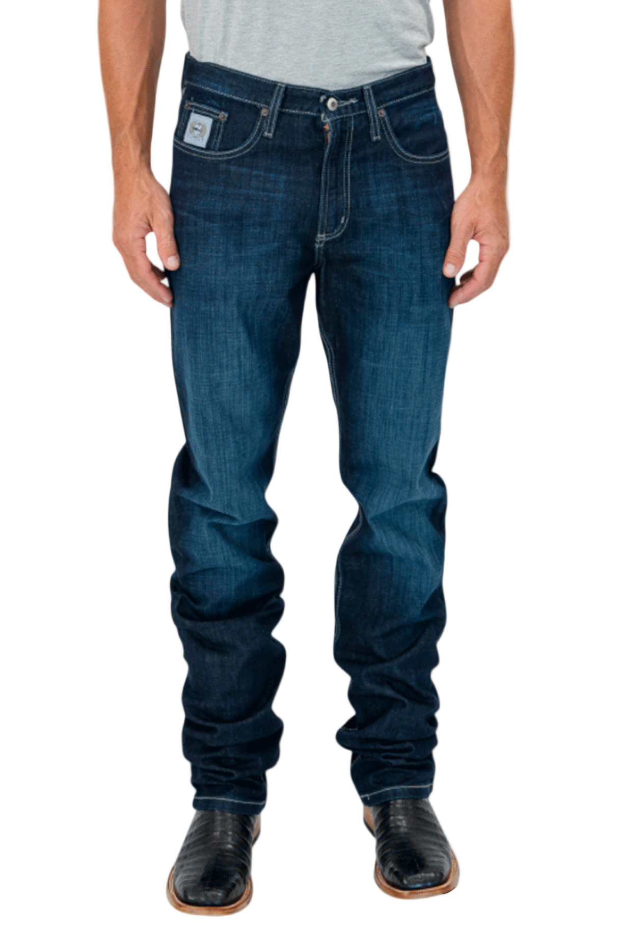 Person wearing dark blue jeans on a white background