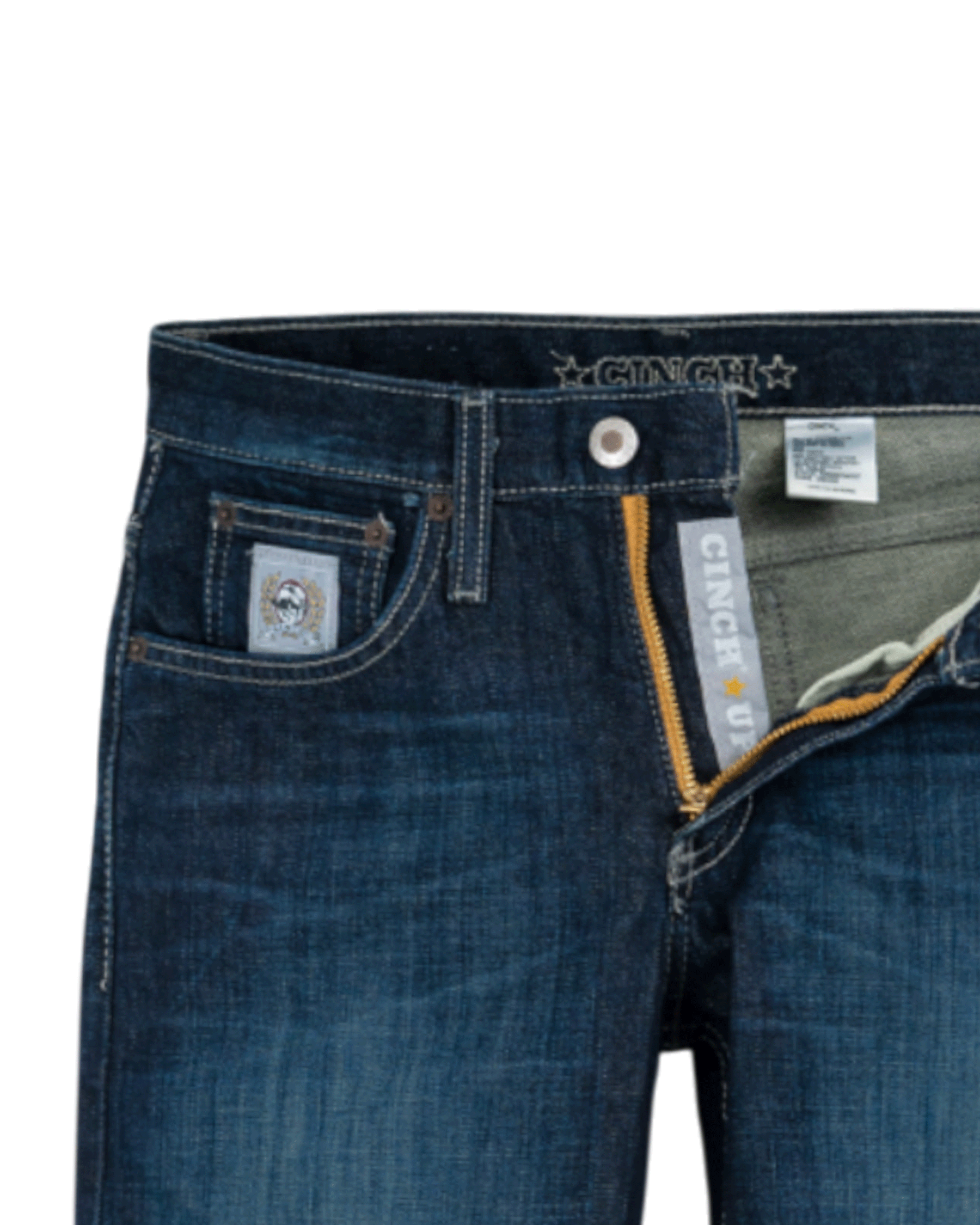 Close-up of blue jeans with brand labels on a white background