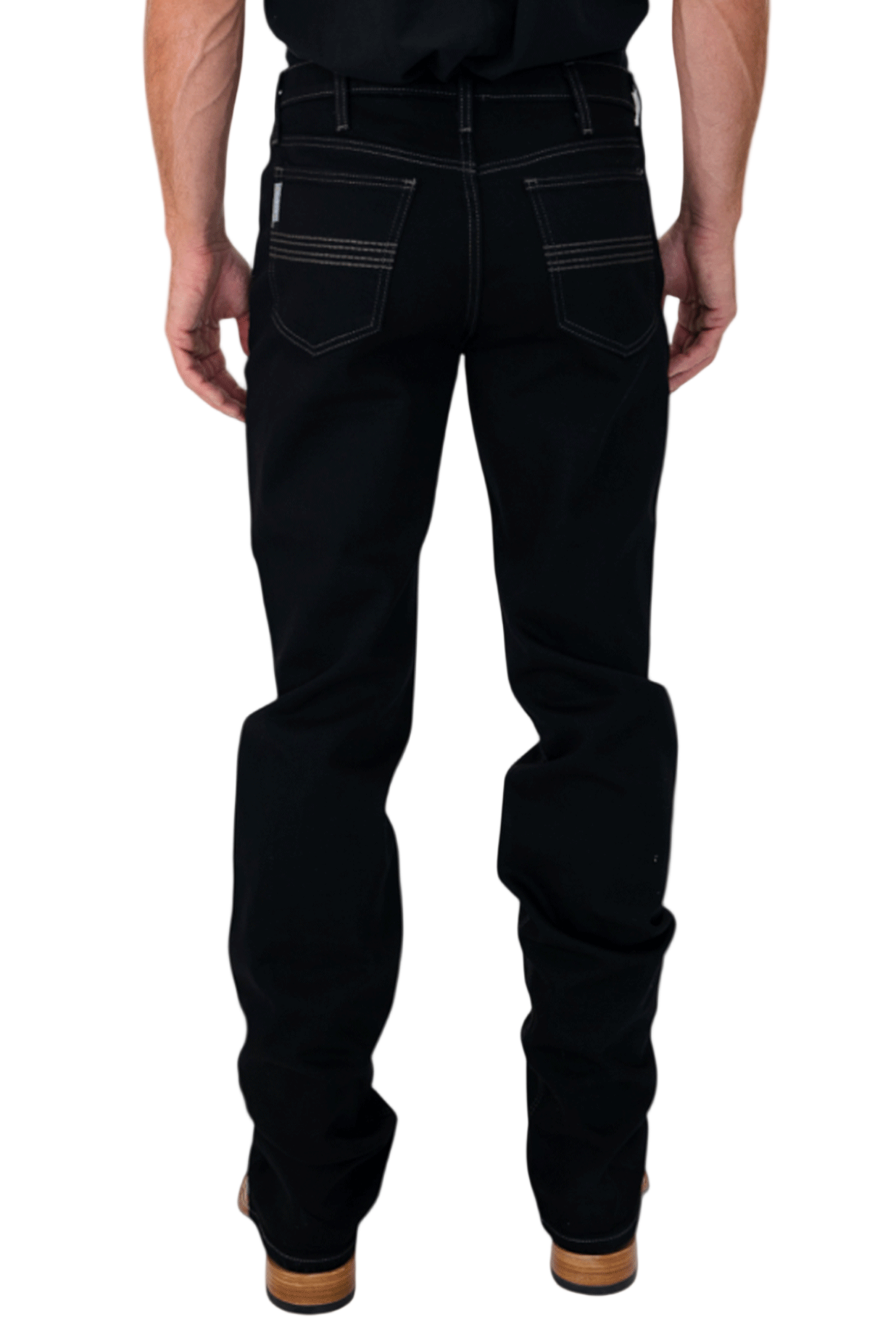Person wearing black jeans on a white background